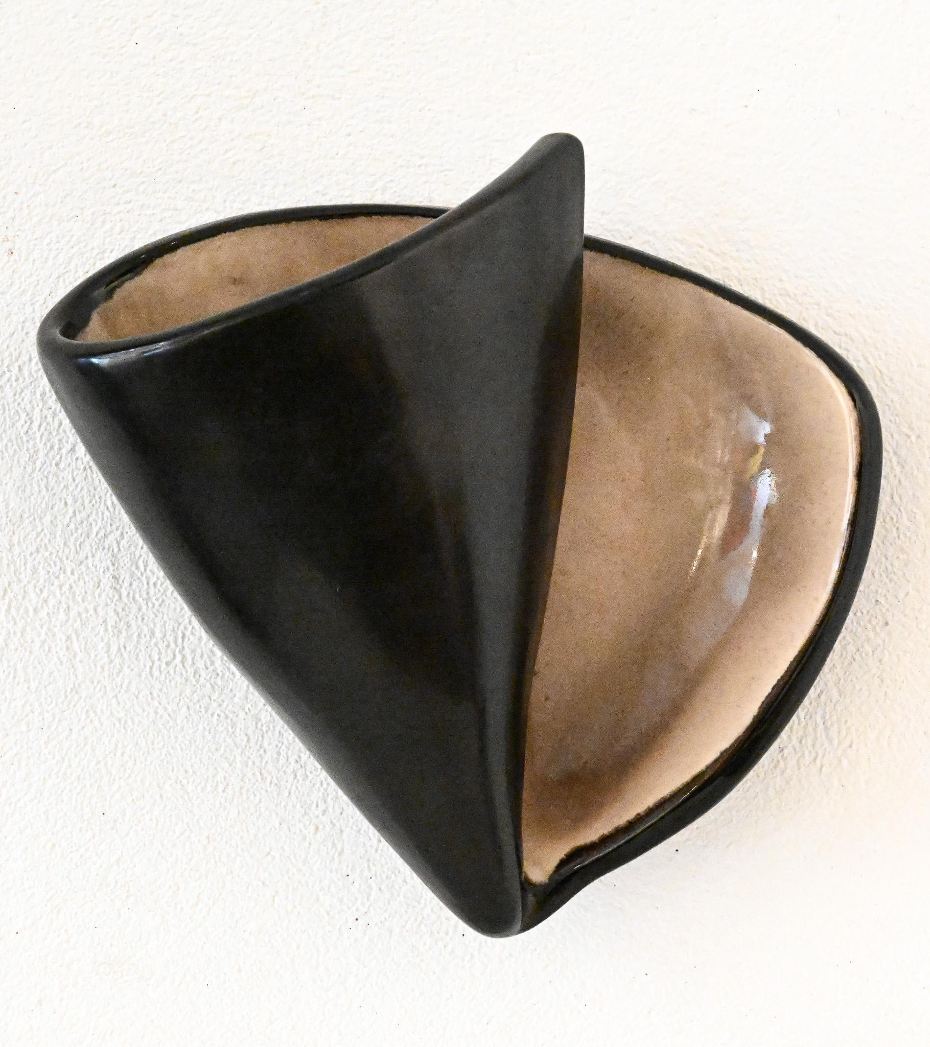 Applique in ceramica 