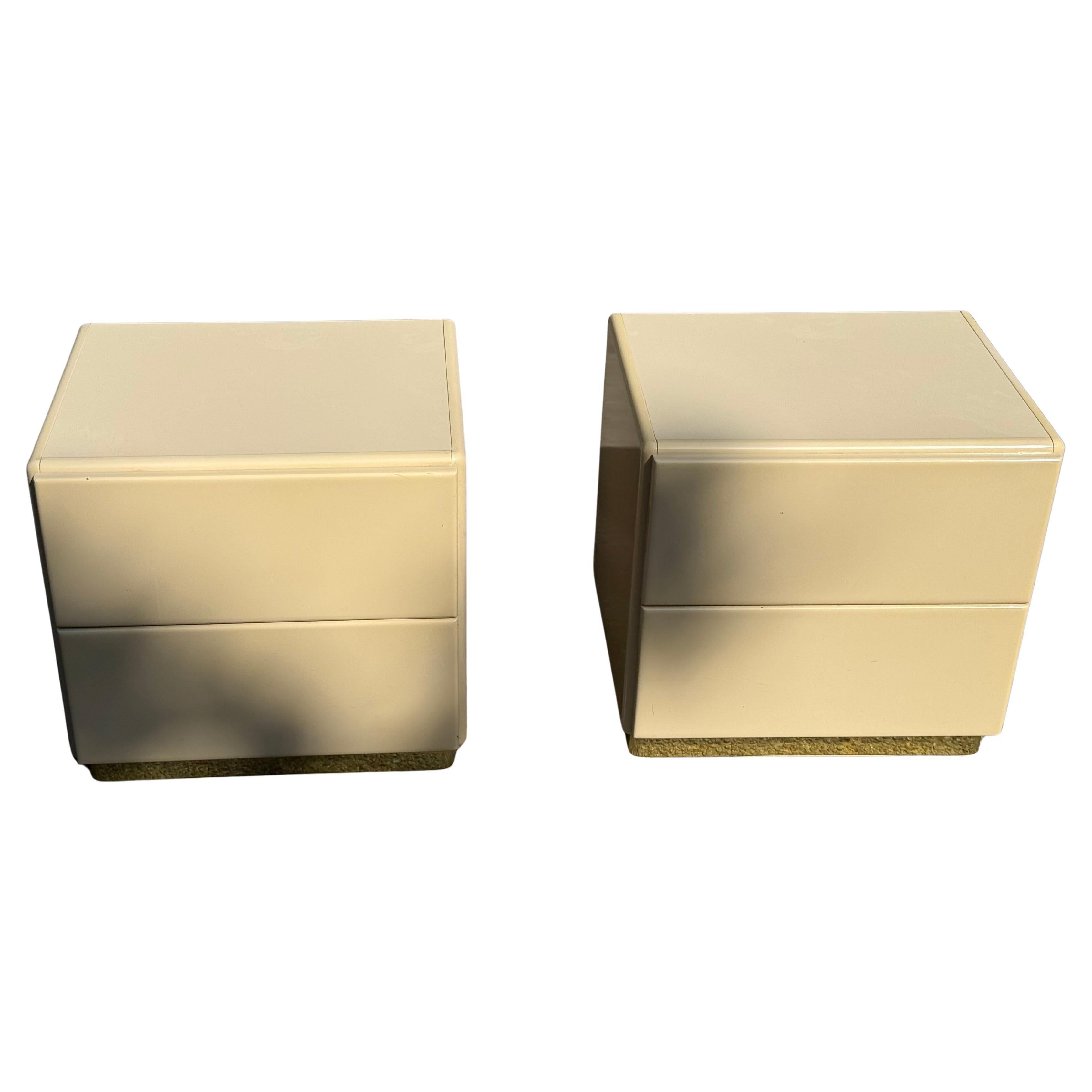 Pair of mid-century 80s cream lacque nightstands by Lane. Gorgeous post modern design. The cream lacquer is smooth. 

Two drawers on each. 

These mid-century modern cream lacquer nightstands bring vintage 1980s charm and practical retro storage to