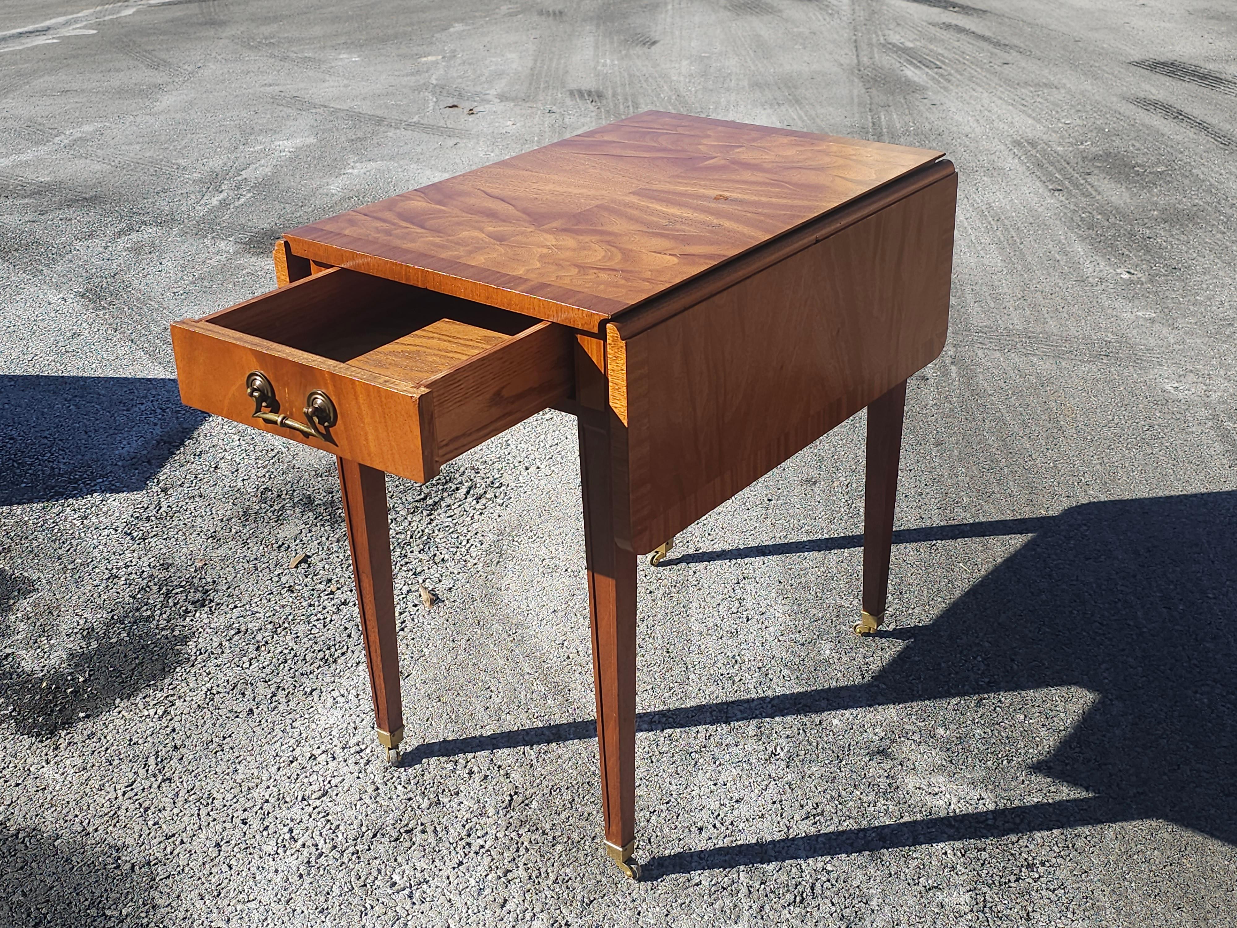 Mid Century Cross-Banded Crotched Mahogany Pembroke  Rolling Side Table In Good Condition For Sale In Germantown, MD