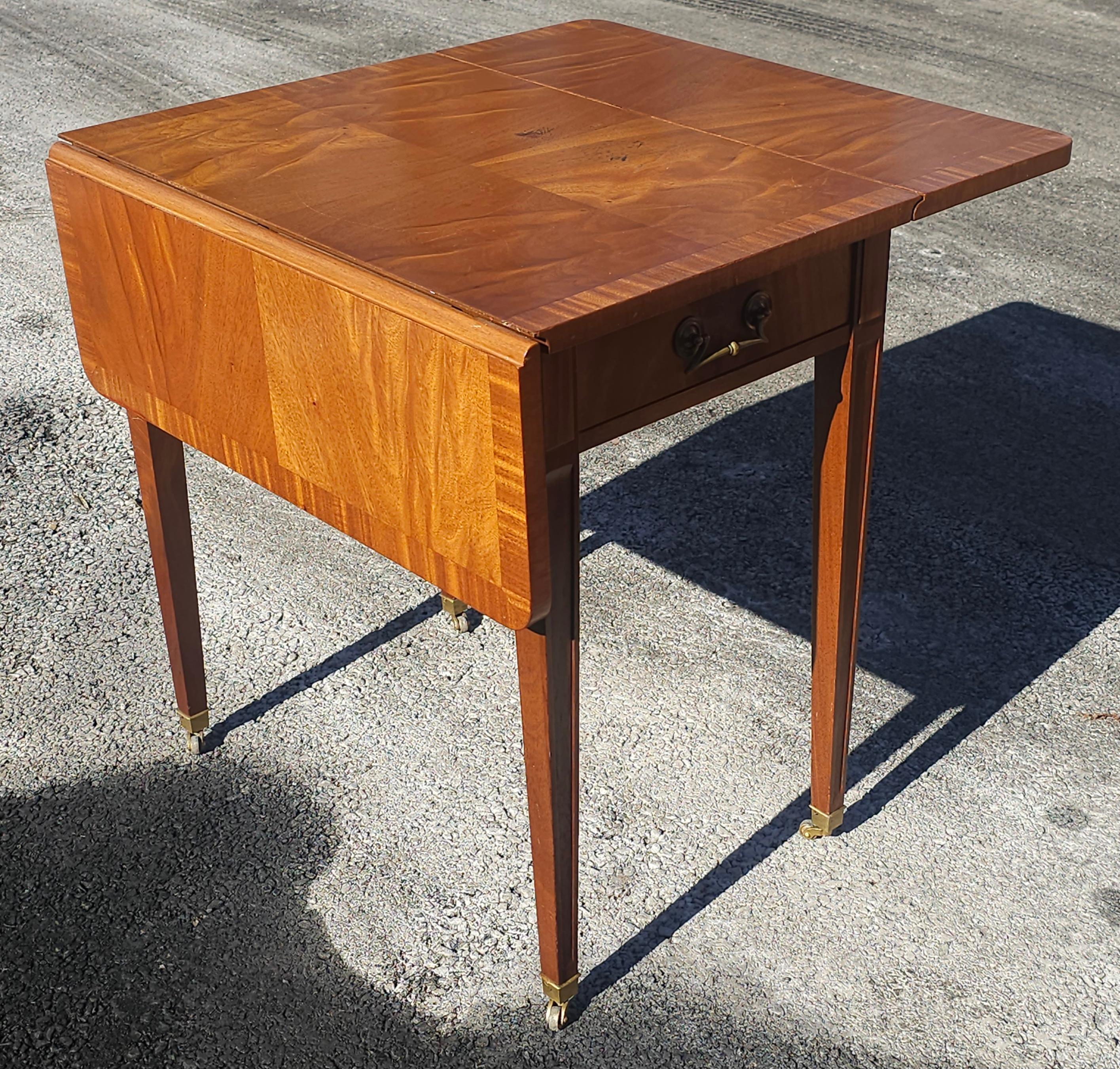 Brass Mid Century Cross-Banded Crotched Mahogany Pembroke  Rolling Side Table For Sale