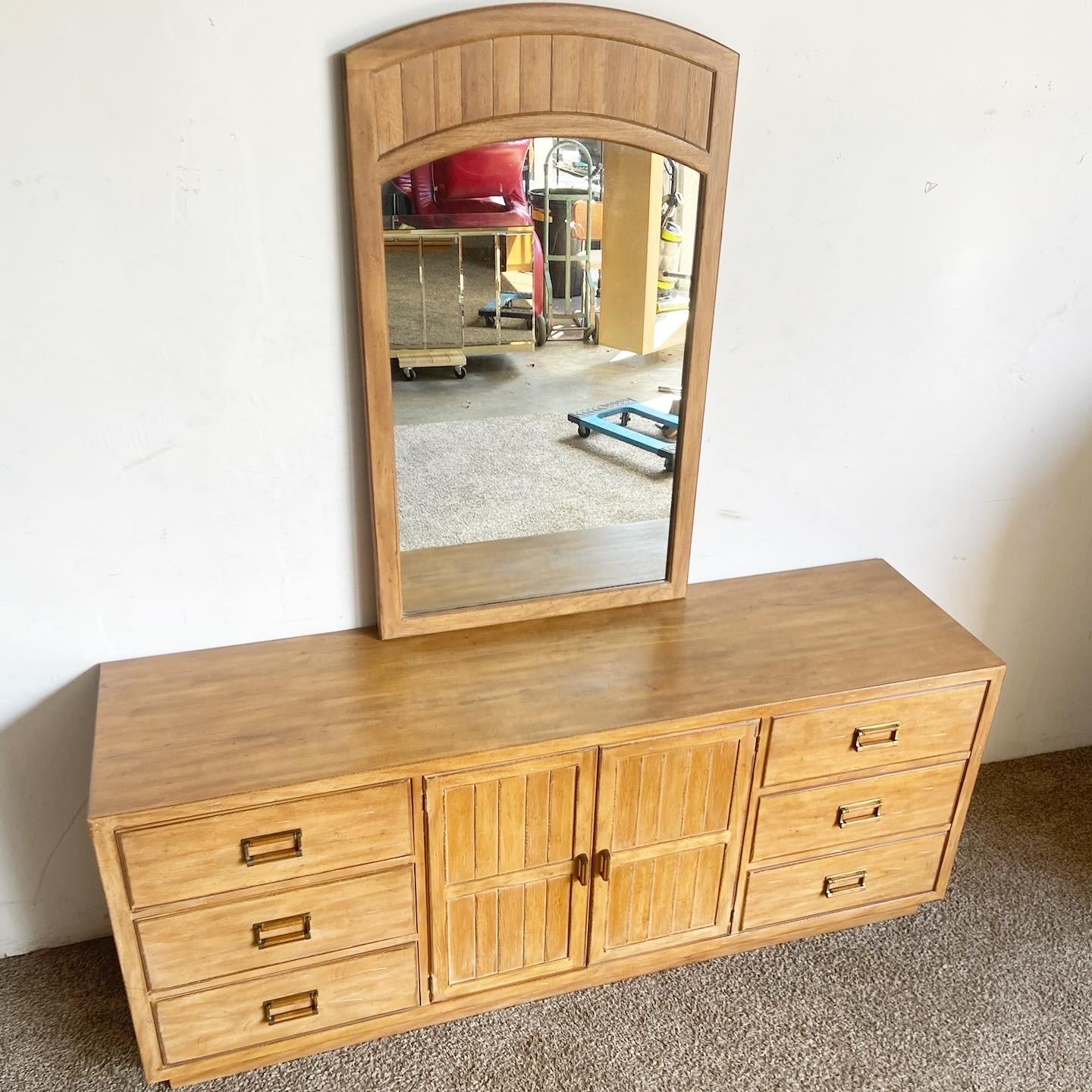 Elevate your bedroom with the Mid-Century Drexel Dresser Set. This two-piece ensemble by Drexel Furniture combines vintage elegance with functional design, featuring nine drawers and a matching mirror.
Minor wear around the edges as seen in the