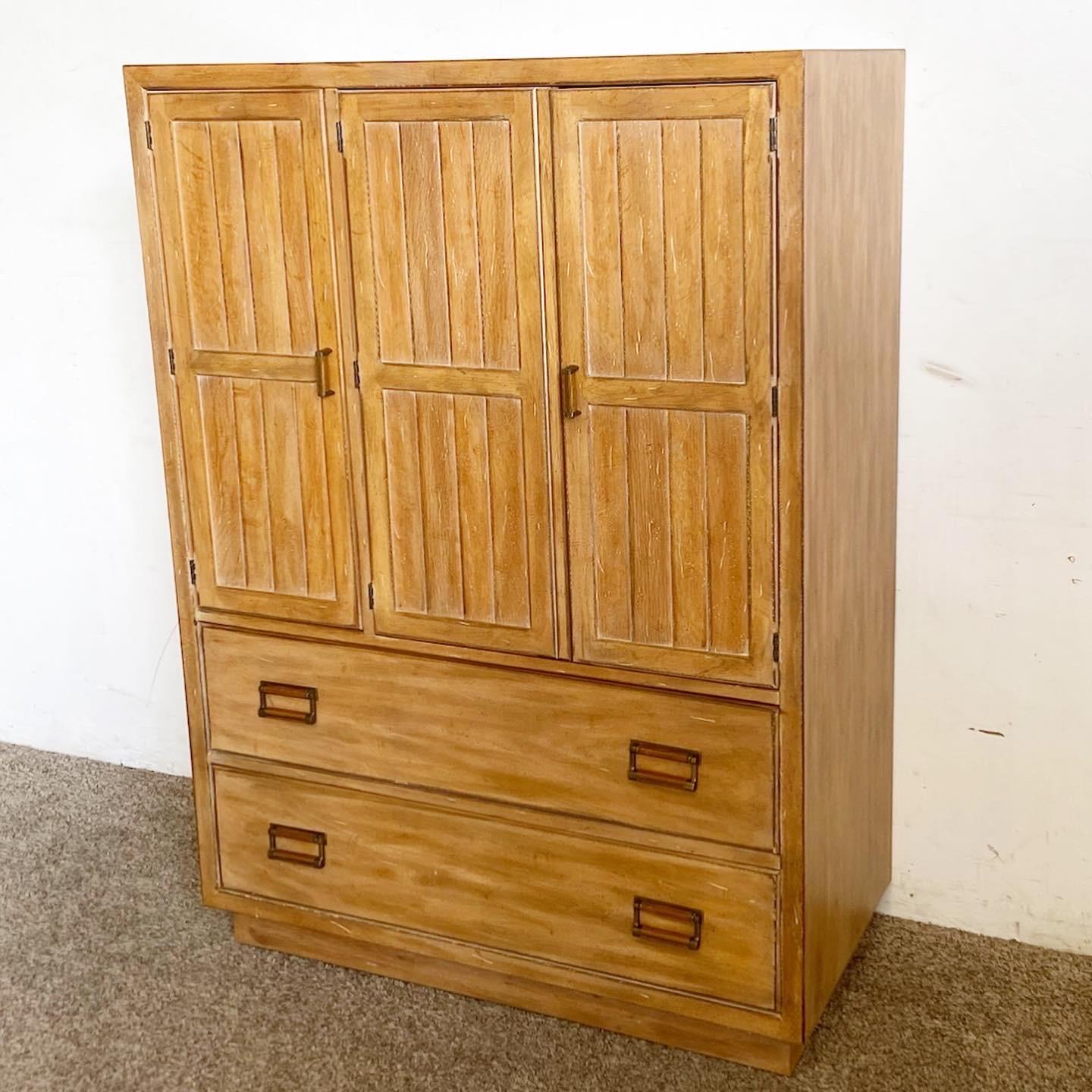 Elevate your space with the Mid-Century Drexel Highboy Armoire. Crafted by Drexel, this timeless piece offers ample storage with a blend of drawers and shelving, embodying both elegance and functionality.
Minor wear around the edges as seen in the