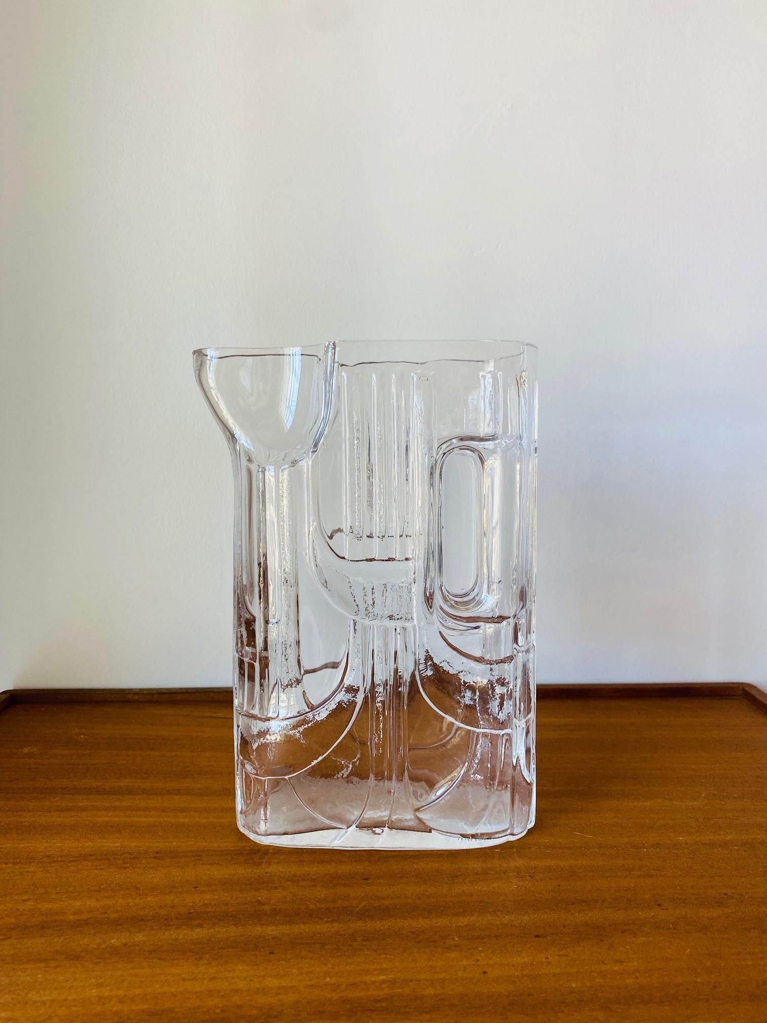 Mid Century rare and hard to find cocktail / martini pitcher by Claus Josef Riedel for Riedel, circa 1960s.  Brutalist in style and essence, high quality vintage crystal radiates as sculptural forms and style collide in this piece.  Stylish, unique