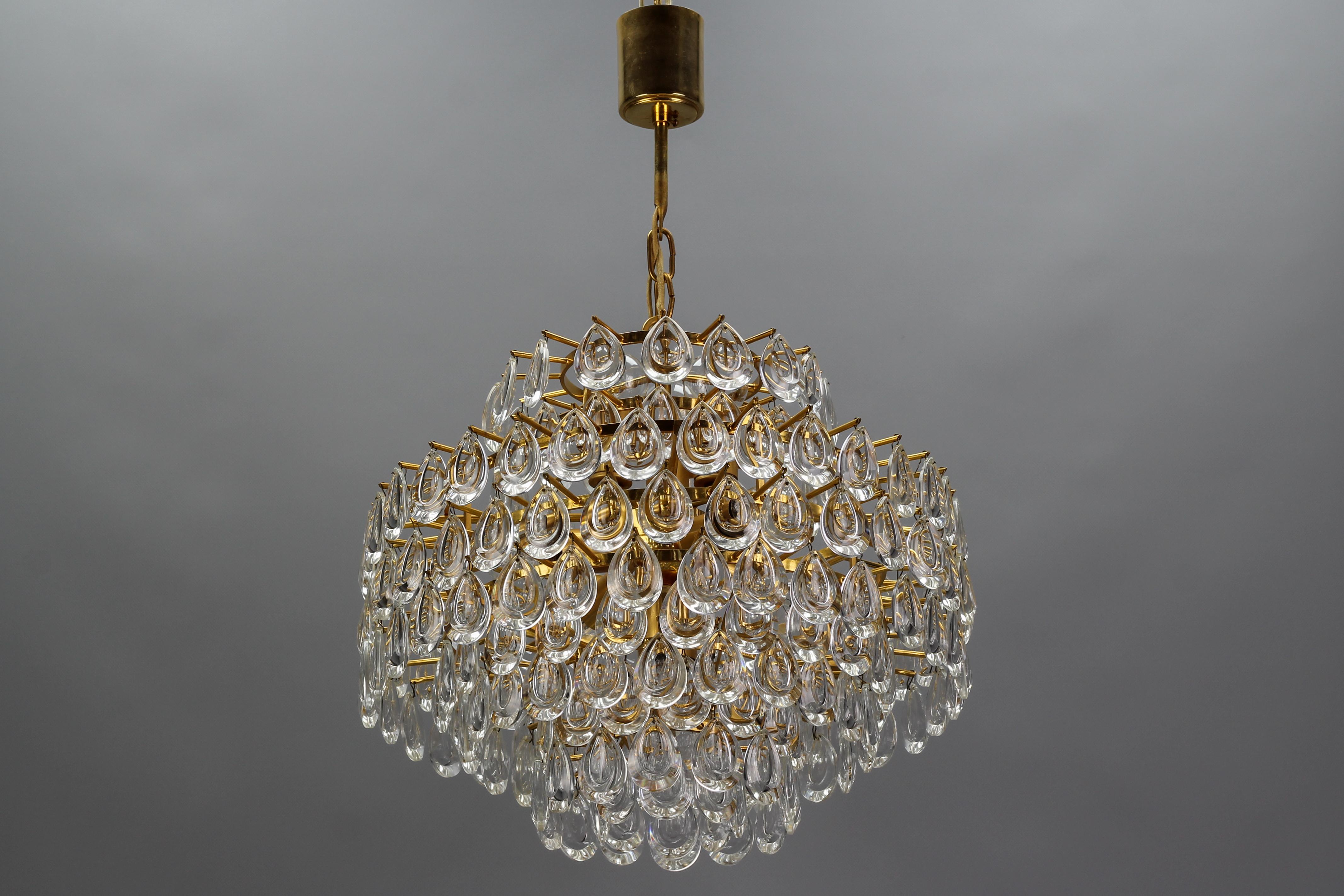 German Mid-Century Crystal Glass and Gilt Brass Seven-Light Chandelier by Palwa For Sale