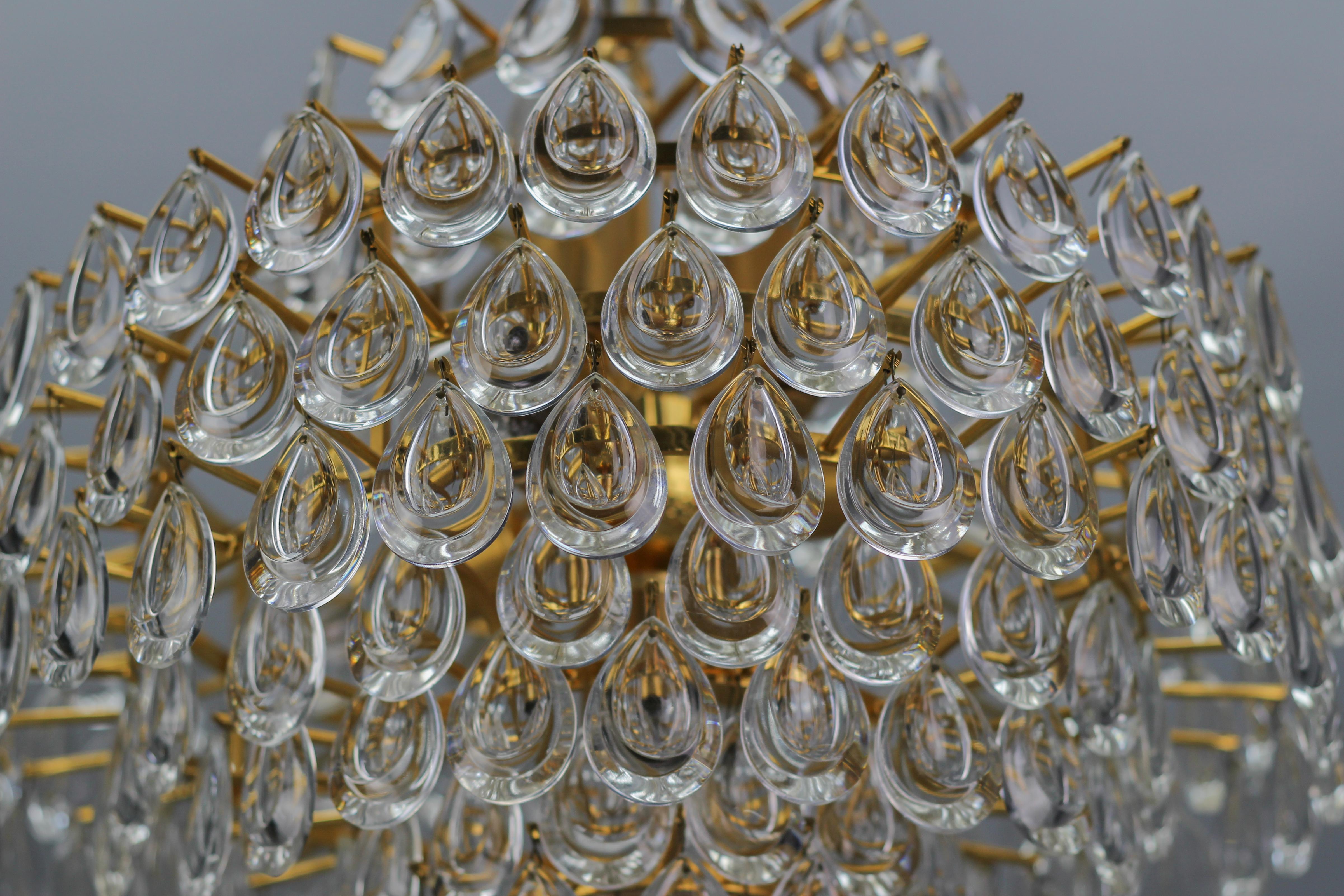 Mid-20th Century Mid-Century Crystal Glass and Gilt Brass Seven-Light Chandelier by Palwa For Sale