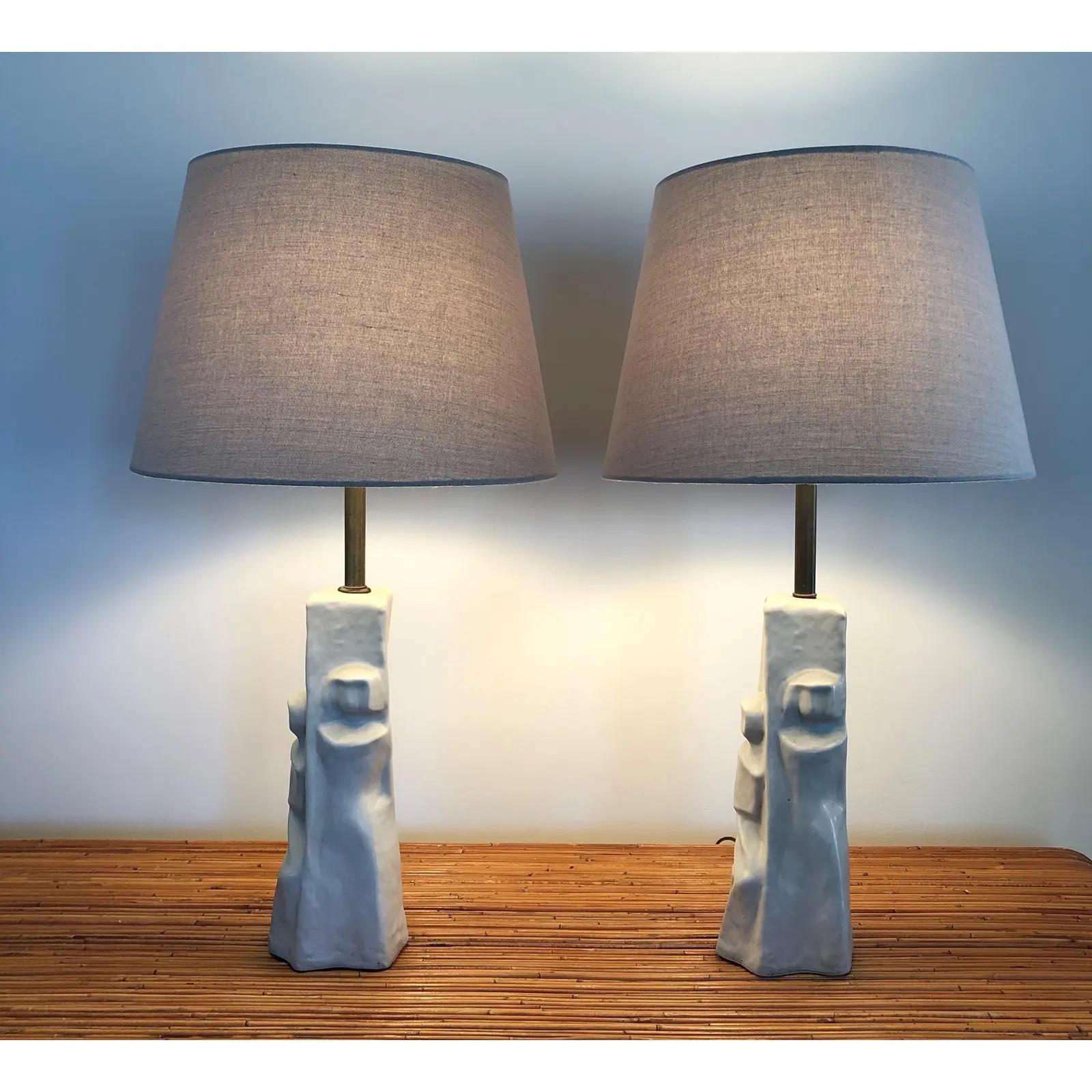 Stunning PAIR of figural ceramic lamps. Screaming mid-century cubism design. Looks like mother and child depiction.
