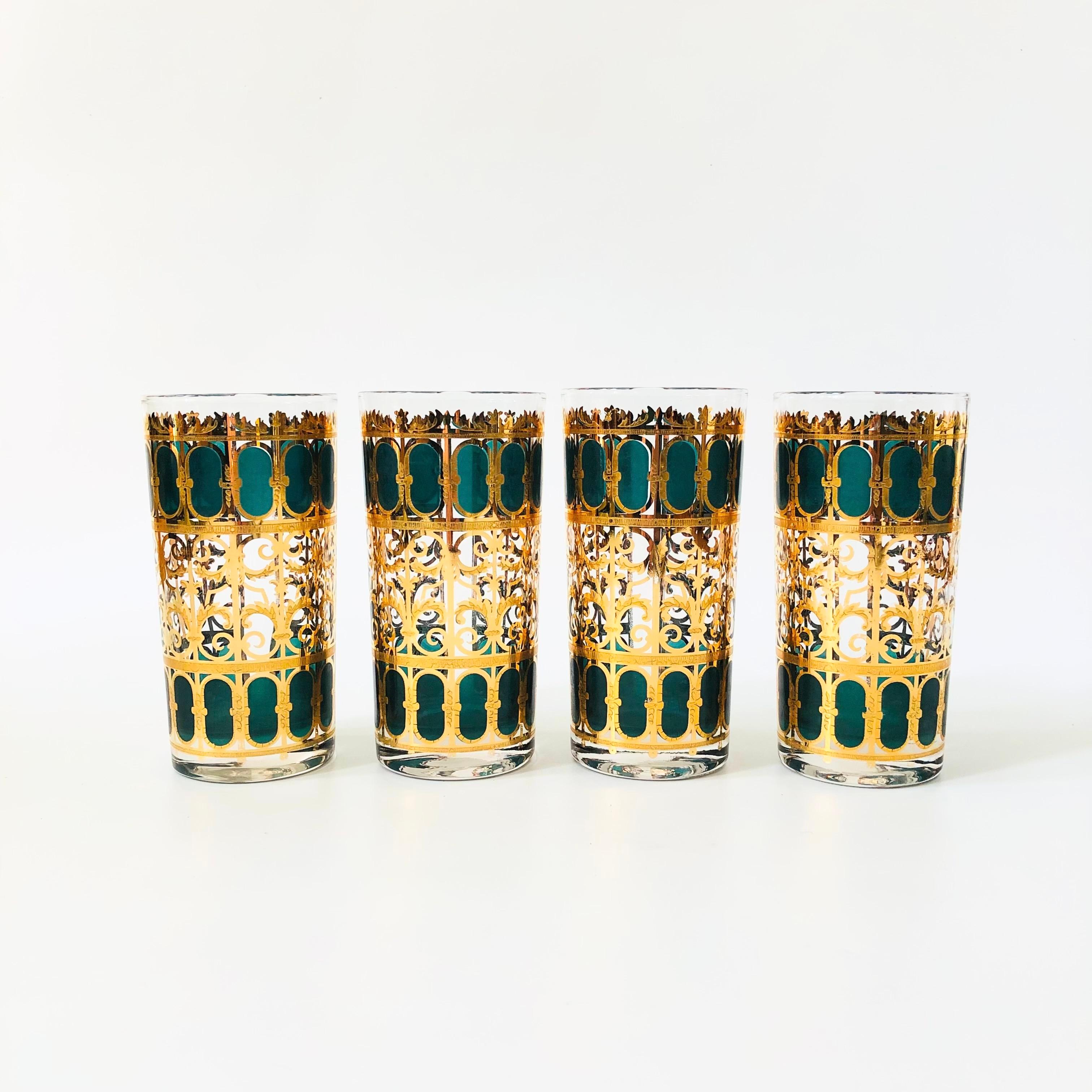 A set of 4 mid century highball tumblers by Culver. Each piece is wrapped in a beautiful 22 kt gold in the 