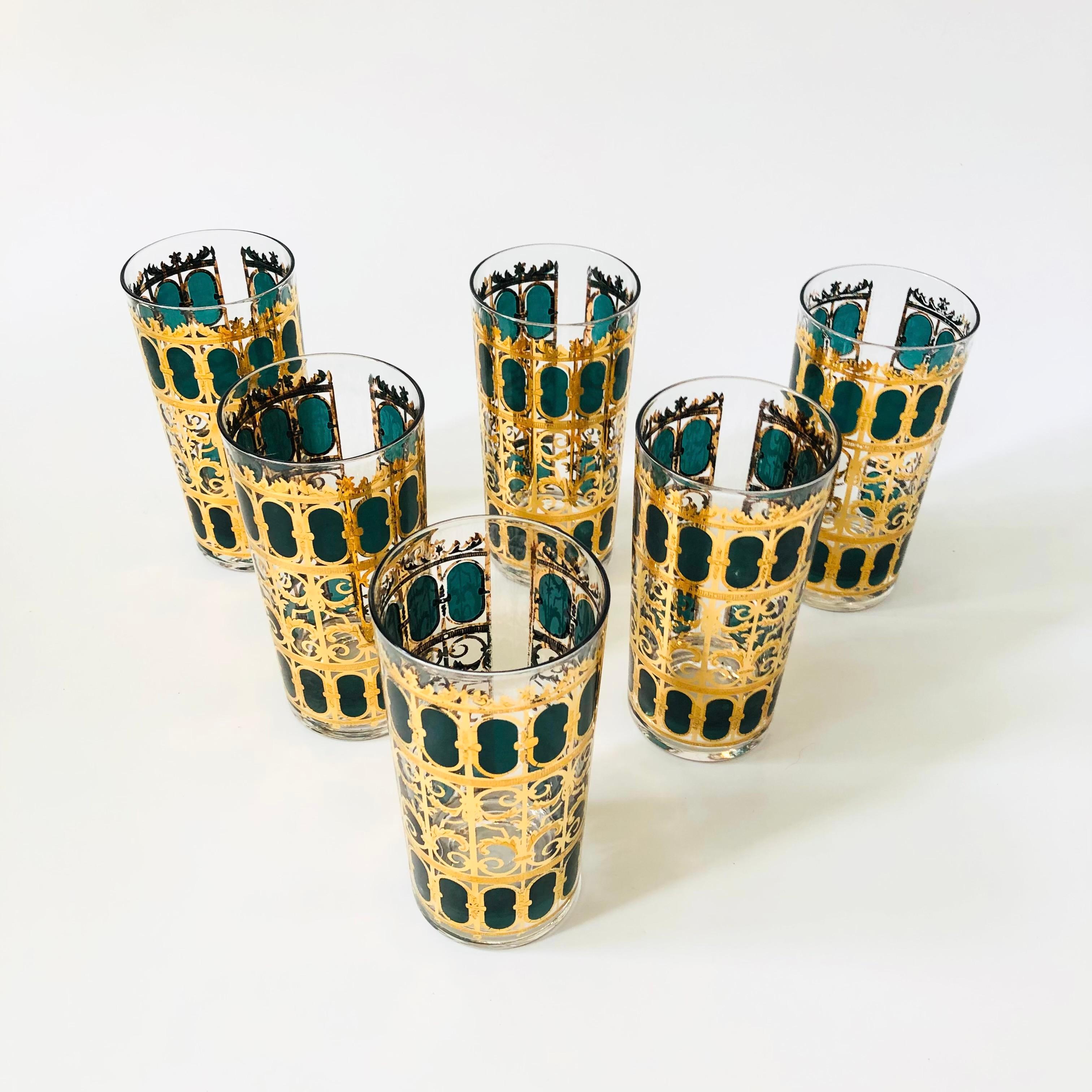 A set of 6 mid century highball tumblers by Culver. Each piece is wrapped in a beautiful 22 kt gold in the 