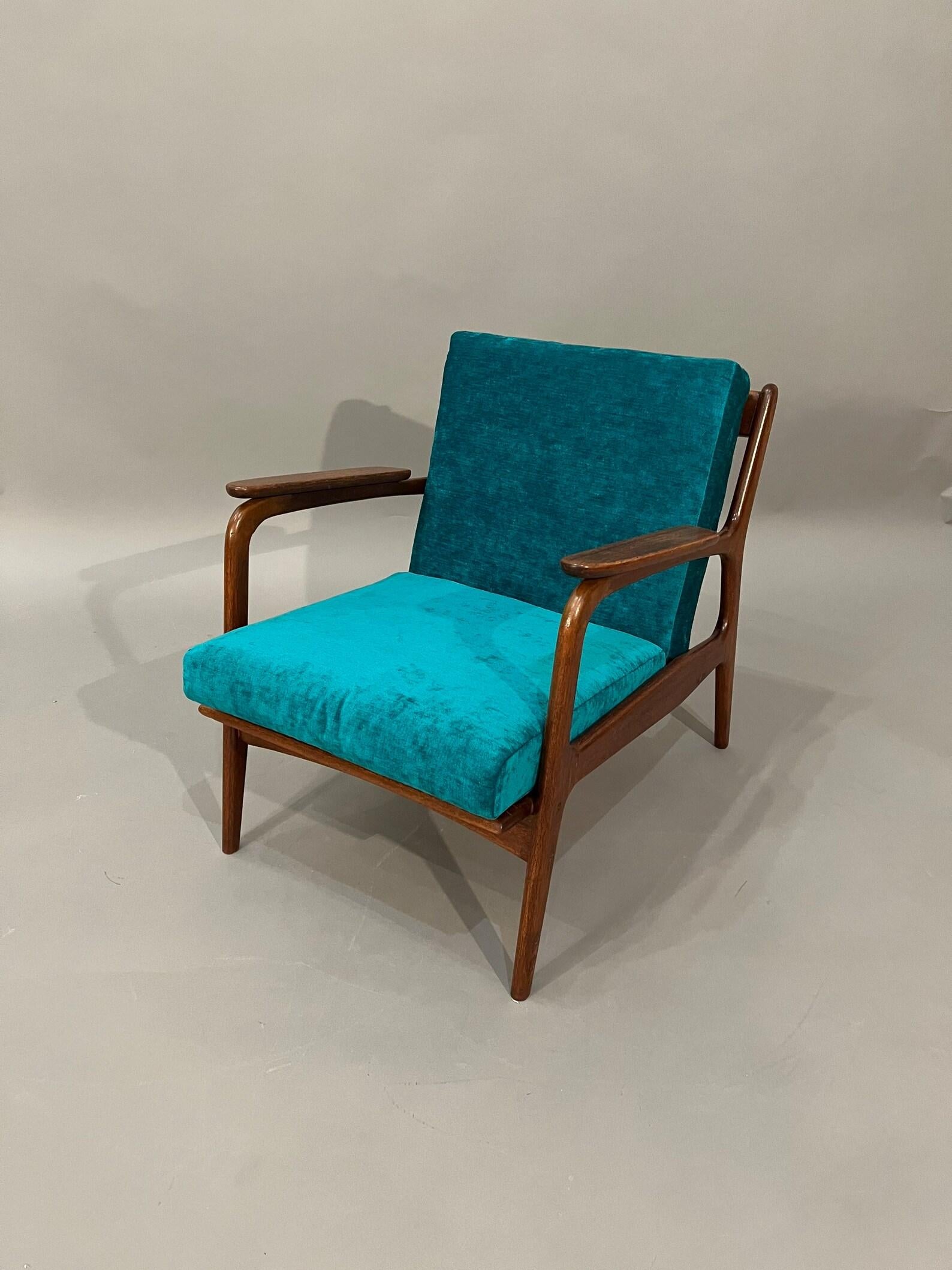 Mid-Century, Curated, Walnut arm lounge chair 1960s Circa completely restored with new cushions with thick blue velvet fabric.

Arm to Arm: 25” inches 
Interior depth: 20” inches 
Cushions thickness: 3.5” inches 
Seat hight: 16” inches  
Arms