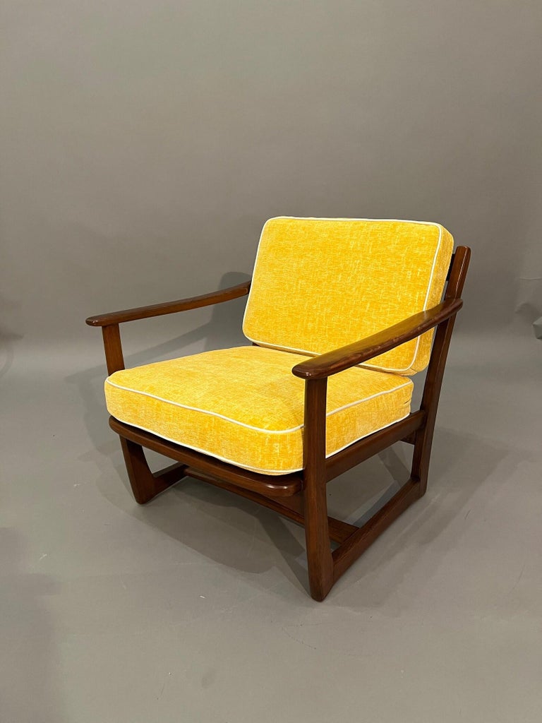 Hollywood regency, Mid-Century, Curated, Walnut arm lounge chair 1960s Circa completely restored with new cushions lavish yellow thick velvet fabric.
Dimensions: 
Arm to Arm: 27” inches 
Interior depth: 20” inches 
Cushions thickness: 3.5” inches