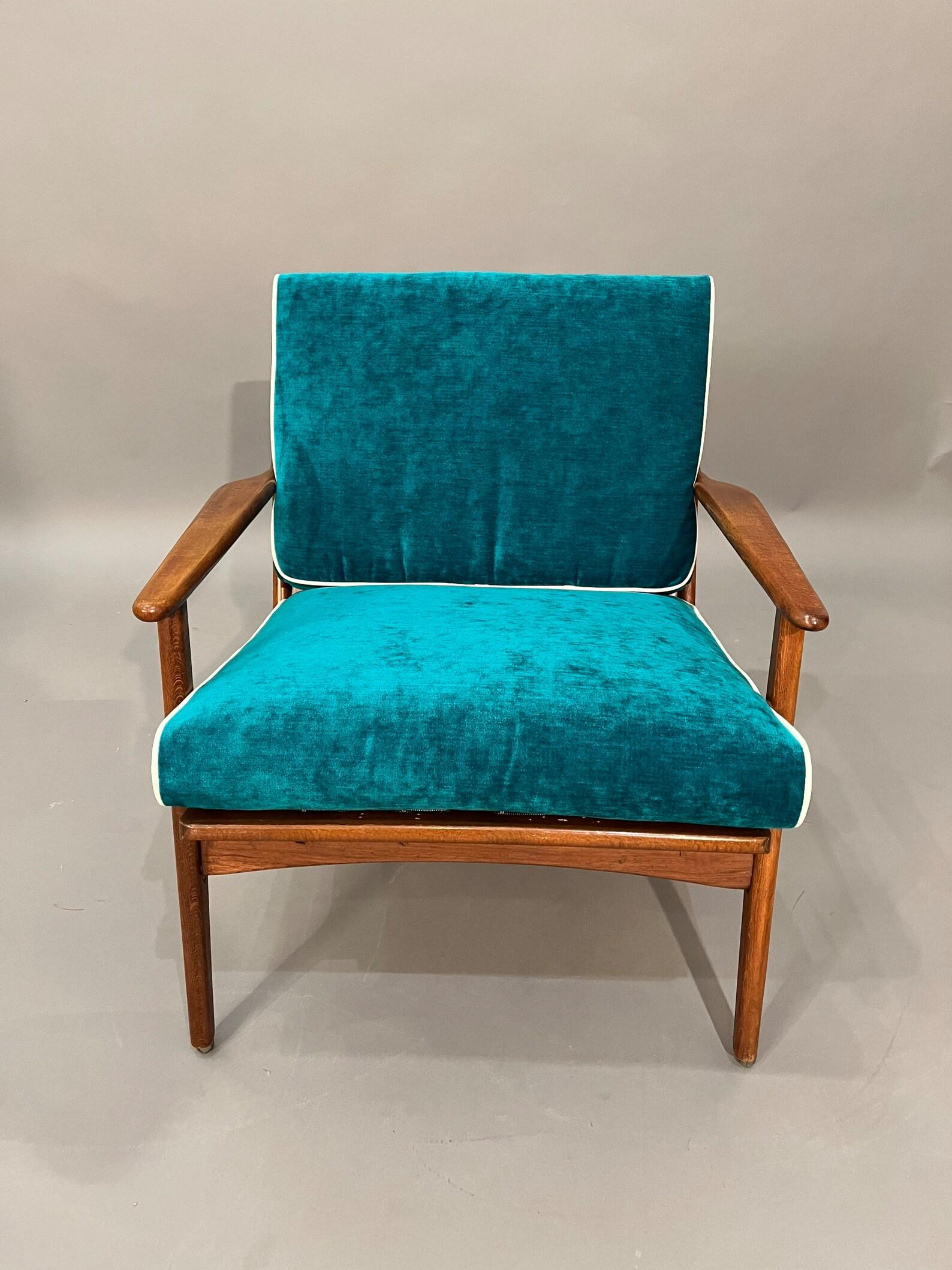 Mid-Century, Curated, Walnut arm lounge chair 1960s Circa completely restored with new cushions with thick blue velvet fabric.

Arm to Arm: 27” inches 
Interior depth: 20” inches 
Cushions thickness: 3.5” inches 
Seat hight: 16” inches 
Arms height: