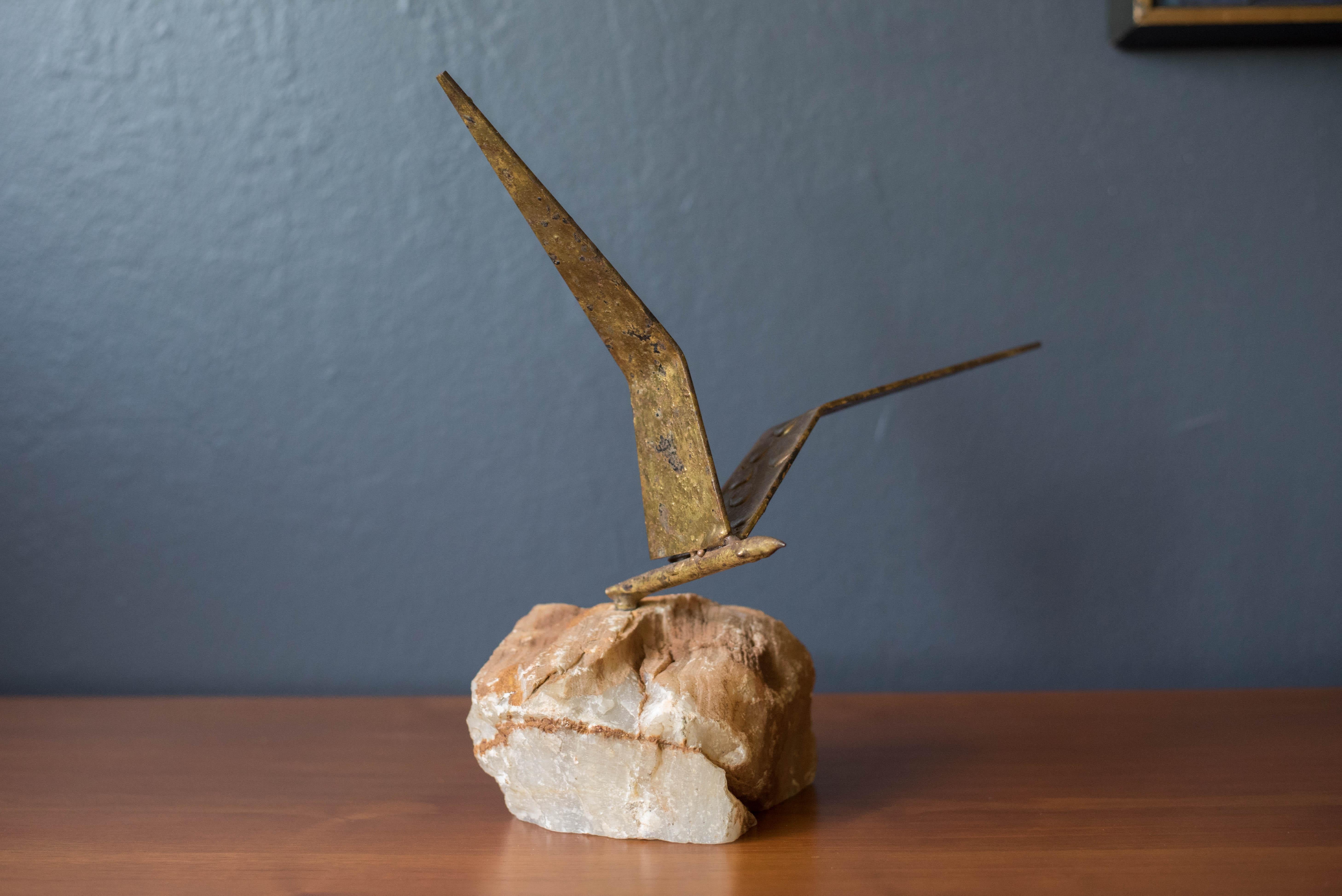 Vintage abstract 'Bird in Flight' sculpture signed C. Jere for Artisan House, circa 1970s. This piece is made of mixed metals with beautifully aged patina and is mounted on a heavy striated stone base. This collector's art piece is perfect for