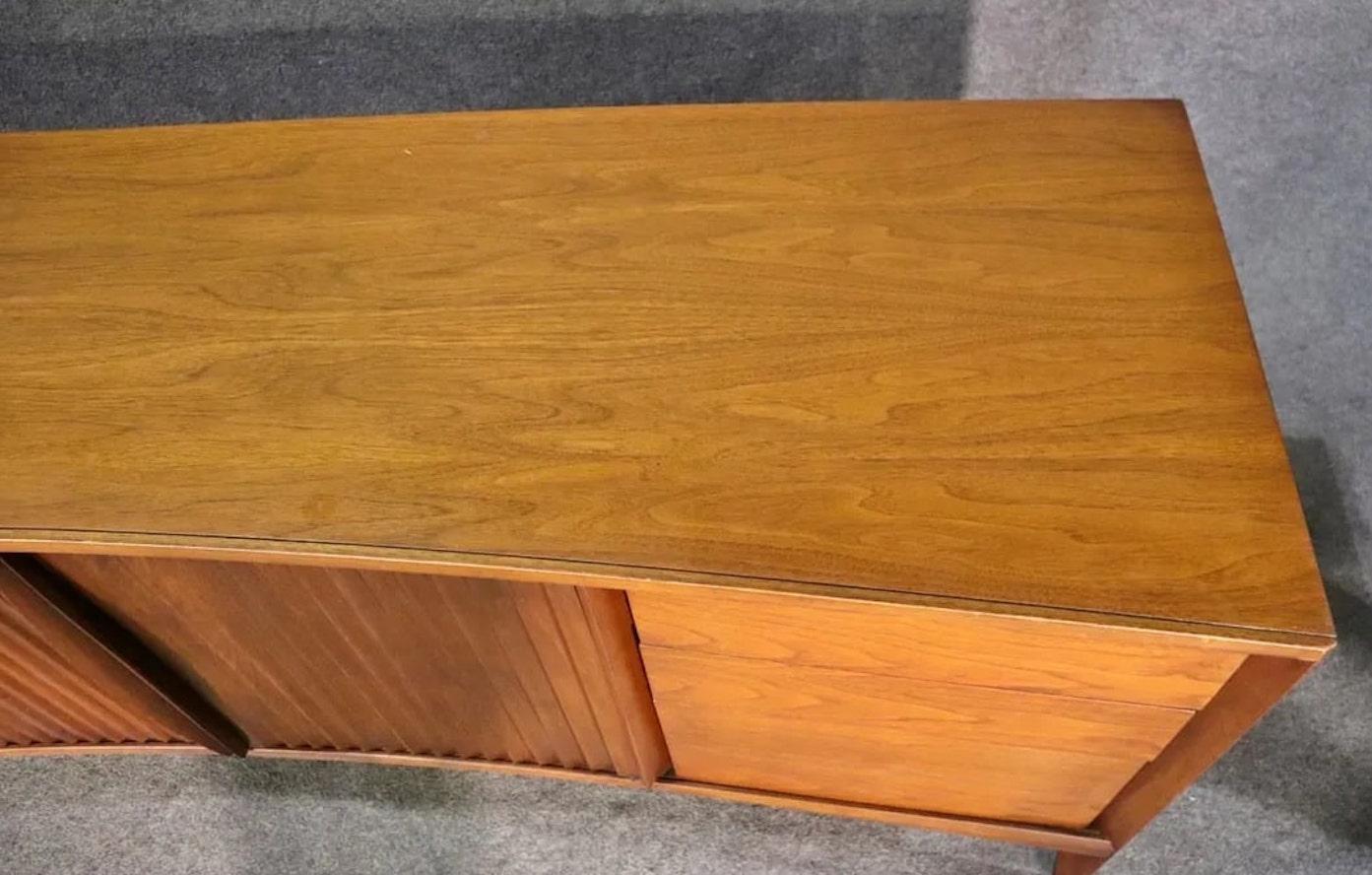 Walnut Mid-Century Curved Dresser by Unagusta For Sale