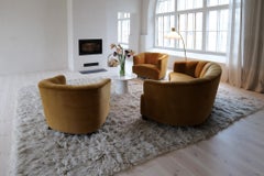 Mid Century Curved Floor Lamp in brass and stone.