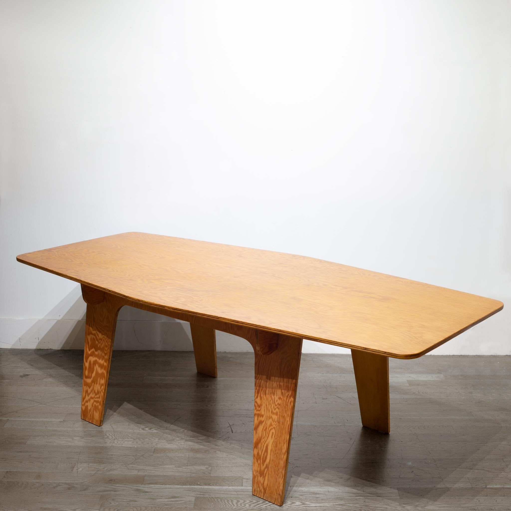 About:

This is an original custom collapsible dining/conference table. Designed by an architect as a portable worktable at job sites. The wooden table breaks down into five pieces and stores flat. 

 Creator: Unknown.
 Date of manufacture