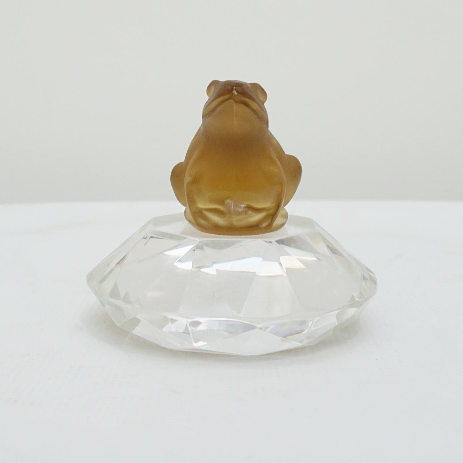 A mid-century paperweight. Coloured glass frog perched on a clear glass base.

Dimensions: H 8cm D 10cm

Origin: Czech

Date: Circa 1950

Item Number: 2710224

 
