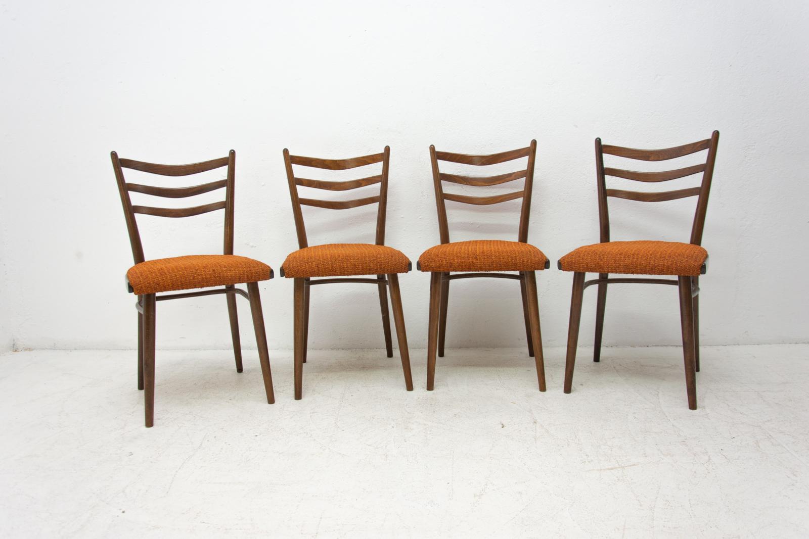 These Czechoslovak dining chairs were made in the 1960s. It was produced by Univerzal Prostejov company. It´s made of dark stained beechwood.

Very interesting shaping. In very good vintage condition. Price is for the set of four.
  