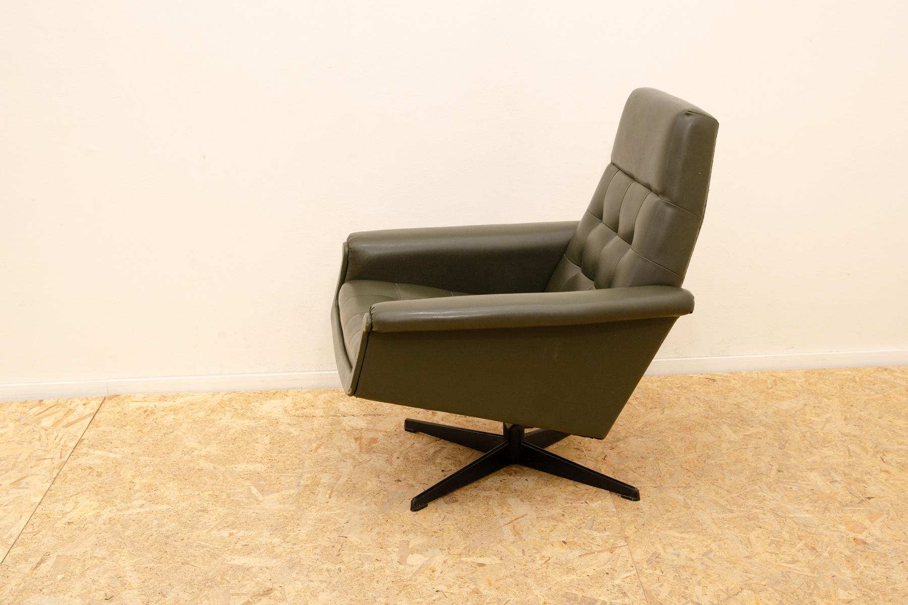 Faux Leather Mid century Czechoslovak swivel armchair, 1970´s, Central Europe For Sale