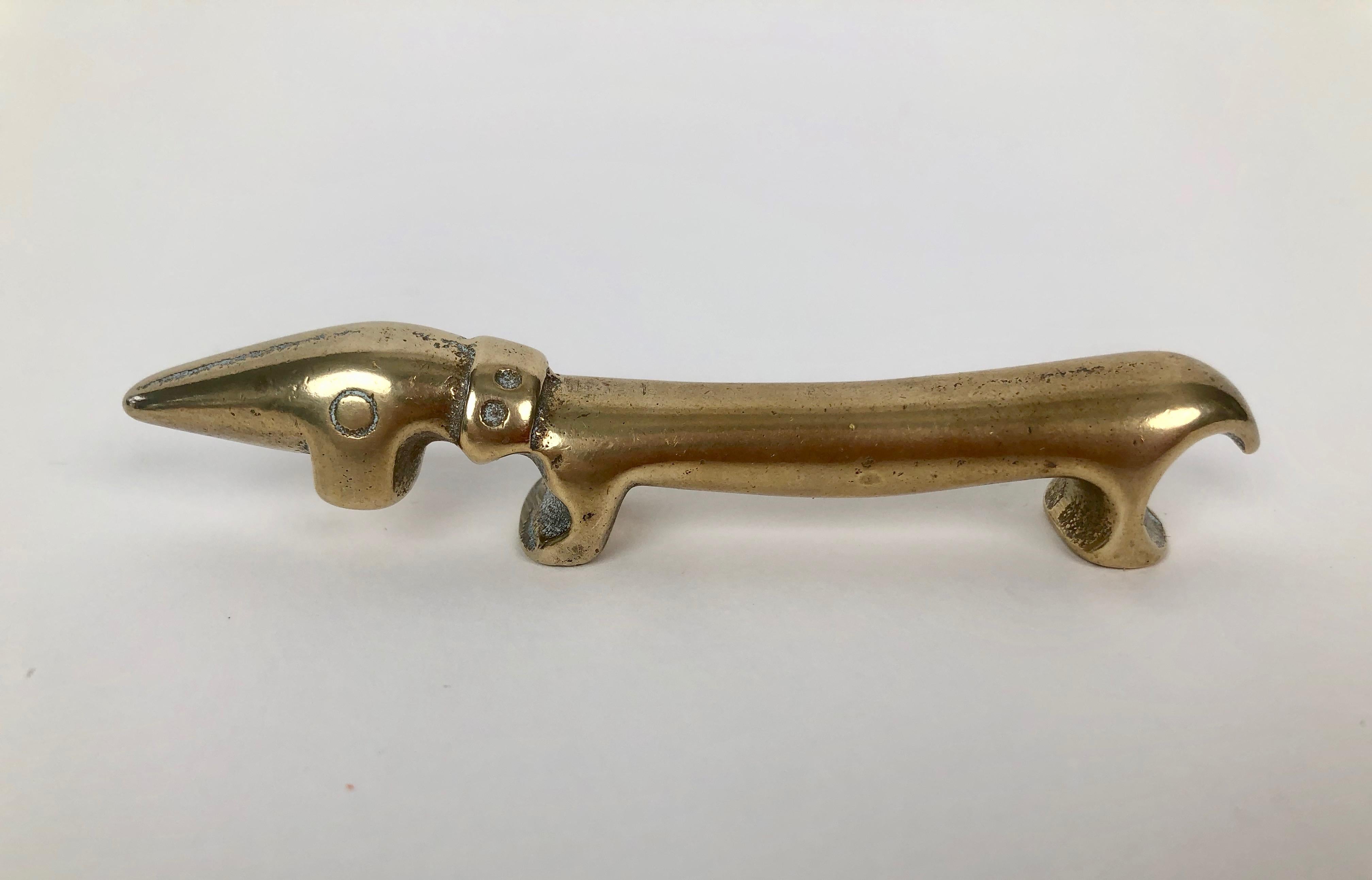 Charming mid-century small size  bottle open in the form of a Dachshund.
Designed by Walter Bosse.