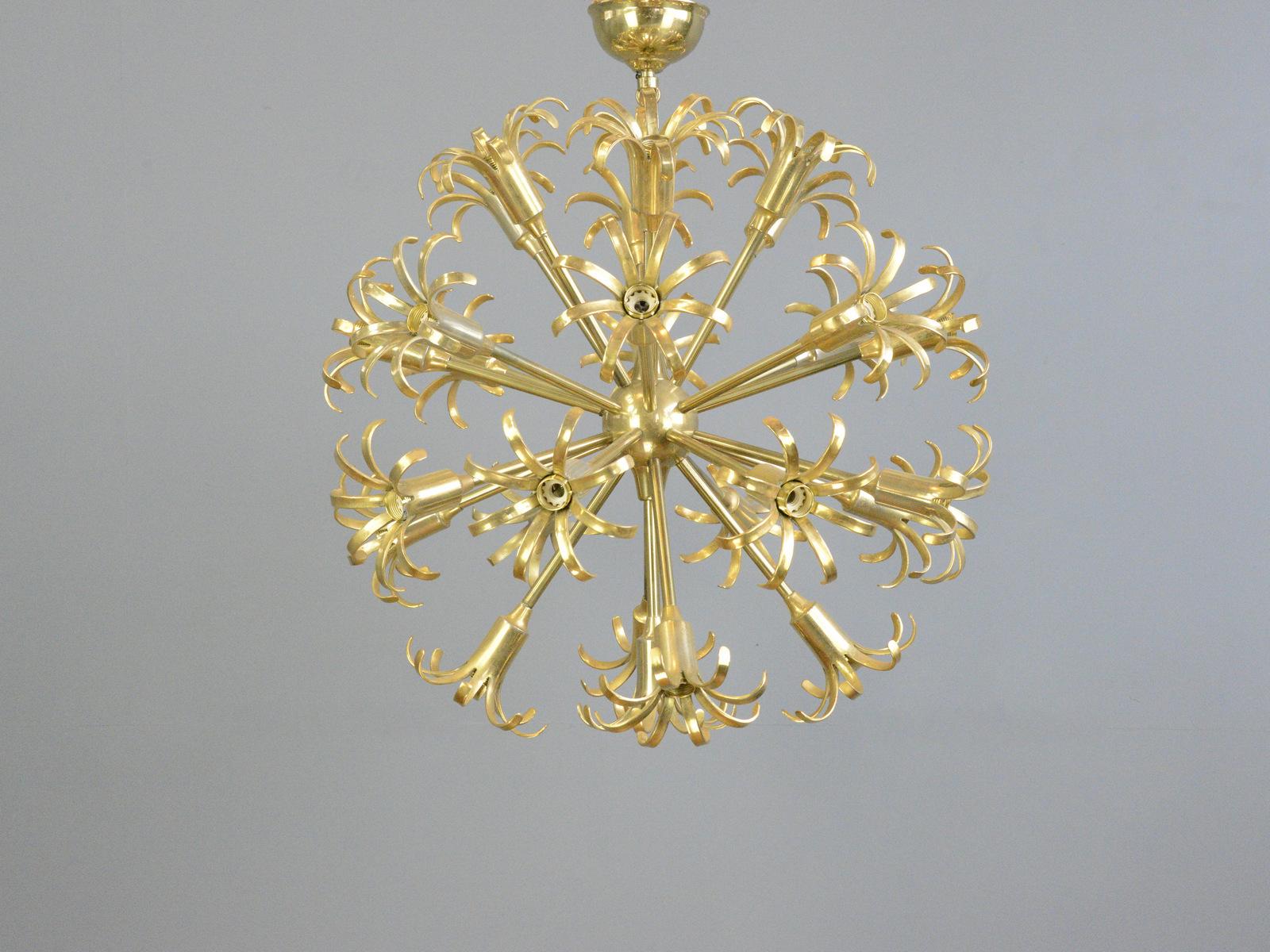 Midcentury Dandelion Chandelier circa 1950s.

- Brass stems
- 26 outlets
- Takes E14 fitting bulbs
- German ~ 1950s
- 65cm wide x 75cm tall inc ceiling rose

Condition Report

Fully re wired with modern electrical components, some light