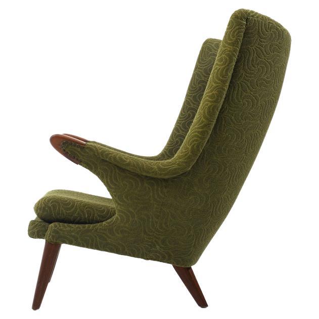 Mid century danish bear lounge chair by Bent Møller Jepsen for Simo Denmark 1959. Beautiful, rarely offered bear chair. Early production. Legs and ends of the armrests in solid teak. Original green fabric. In very good original vintage condition!