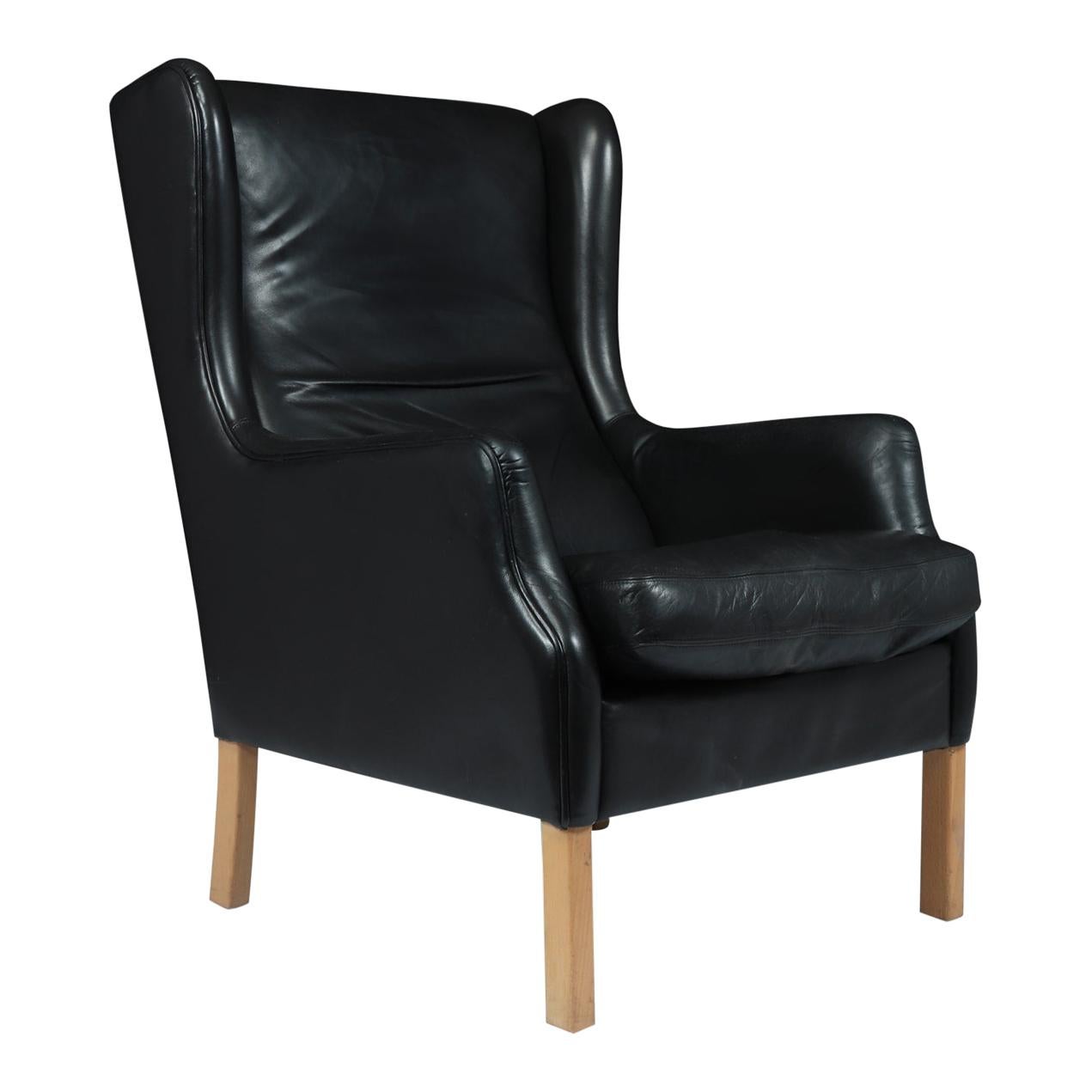 Midcentury Danish Black Leather Wing Chair by Thams For Sale at