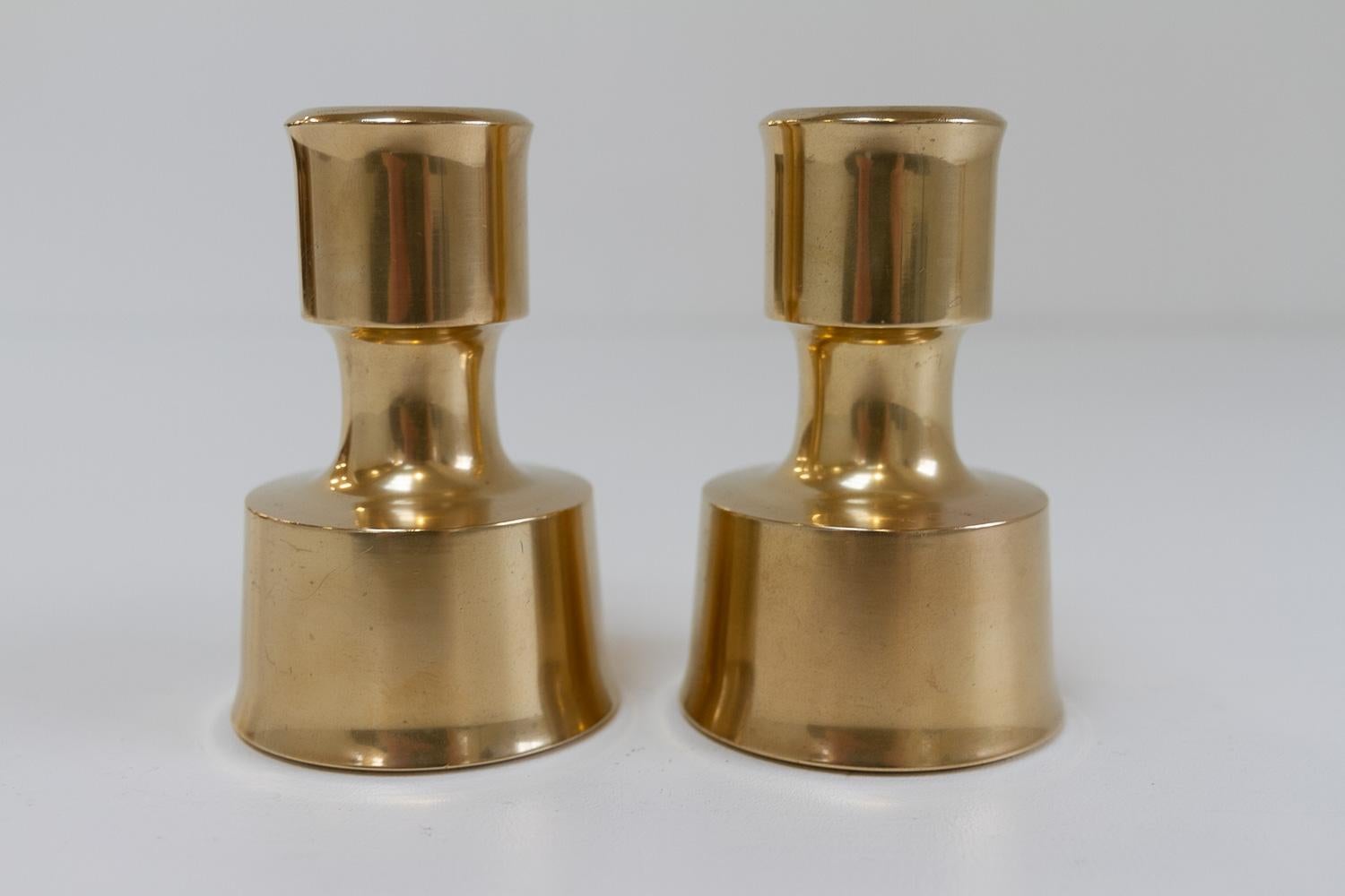 Mid-Century Danish Brass Candleholders by Jens Quistgaard,  1960s. Set of 2.
Danish Mid-Century Modern candle holders in solid cast brass designed by Jens Harald Quistgaard for Dansk Designs in the 1960s, set of 2.

Beautiful pair of vintage brass