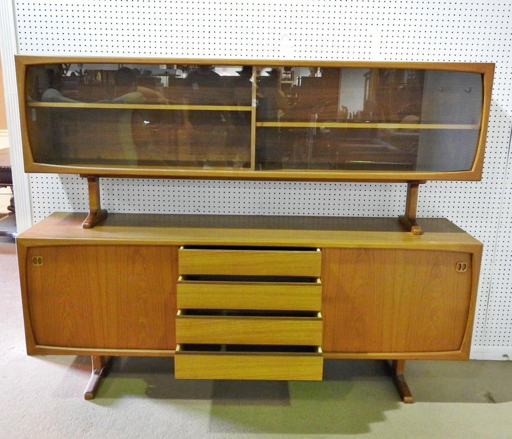 Danish made teak credenza with topper. Two piece unit with ample storage for living or dining room.
(Please confirm item location - NY or NJ - with dealer).
 