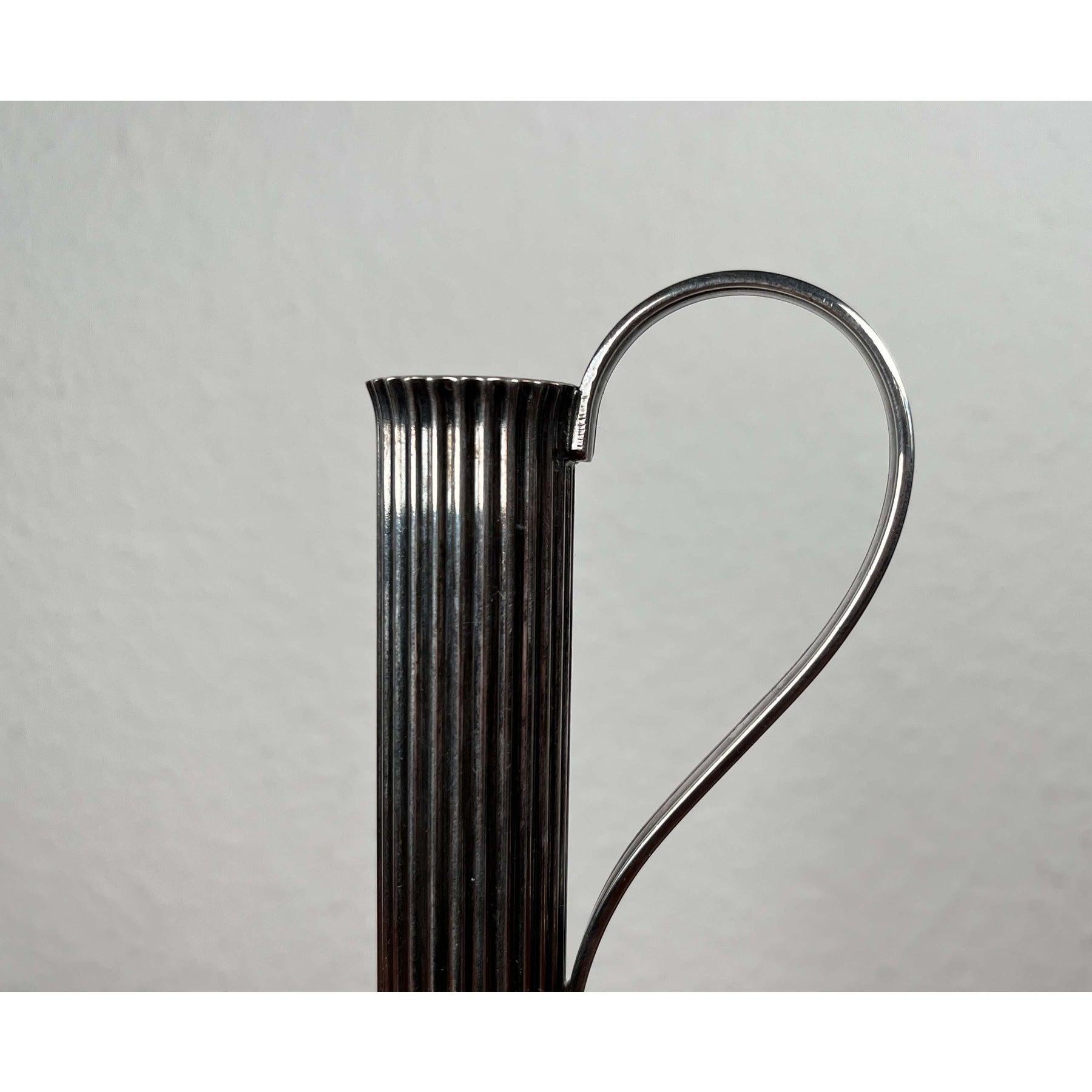 Mid-Century Danish Carafe Vase from Prima, 1960s, in Very Good conditions. Designed 1960 to 1969 This piece has an attribution mark.

Additional information:
Materials: Metal
Color: Silver
Style: Mid-Century Modern
Period: 1960s
Country of Origin: