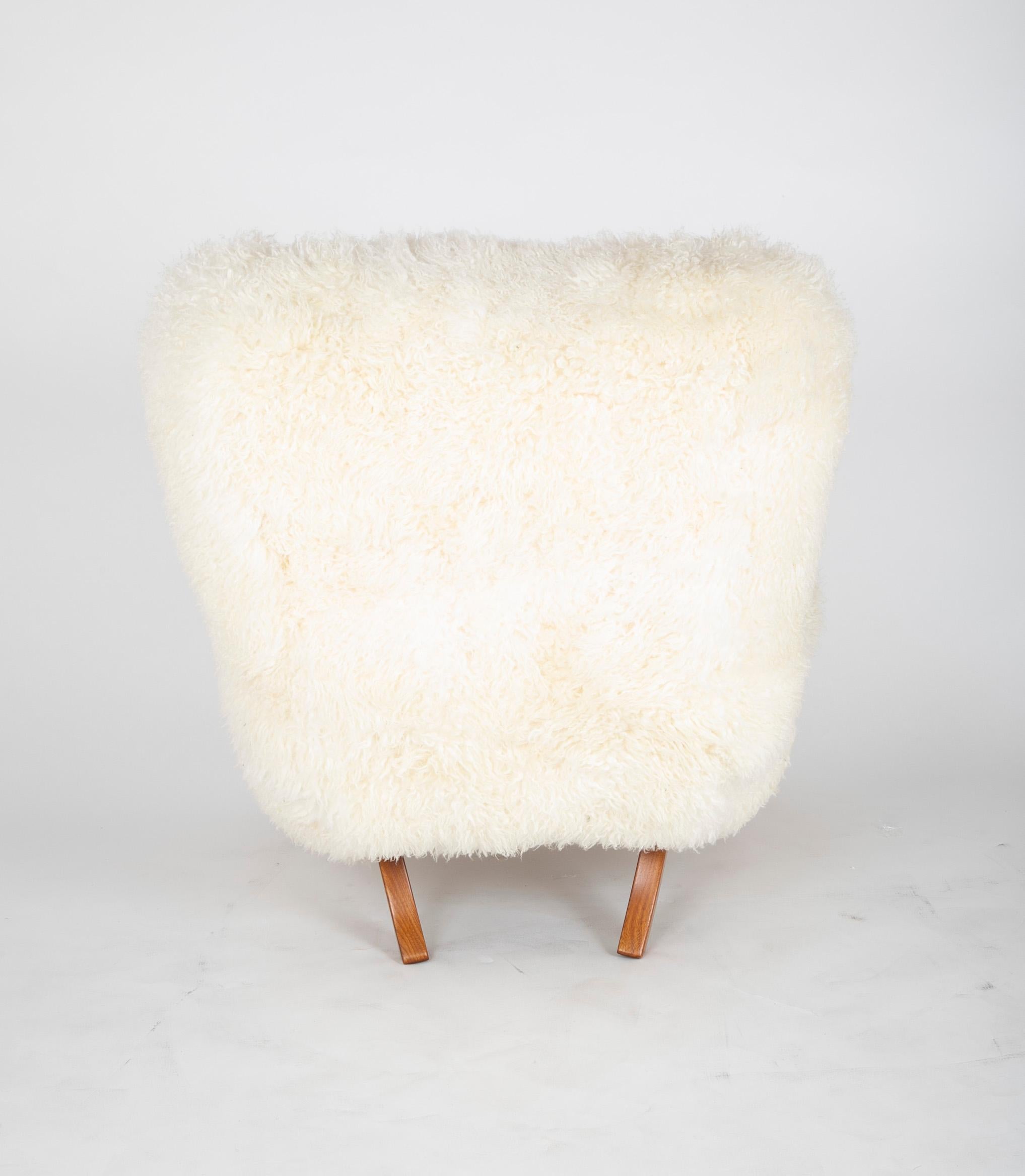 Midcentury Danish Chair of Elm Wood and Sheepskin in the Style of Arctander 6