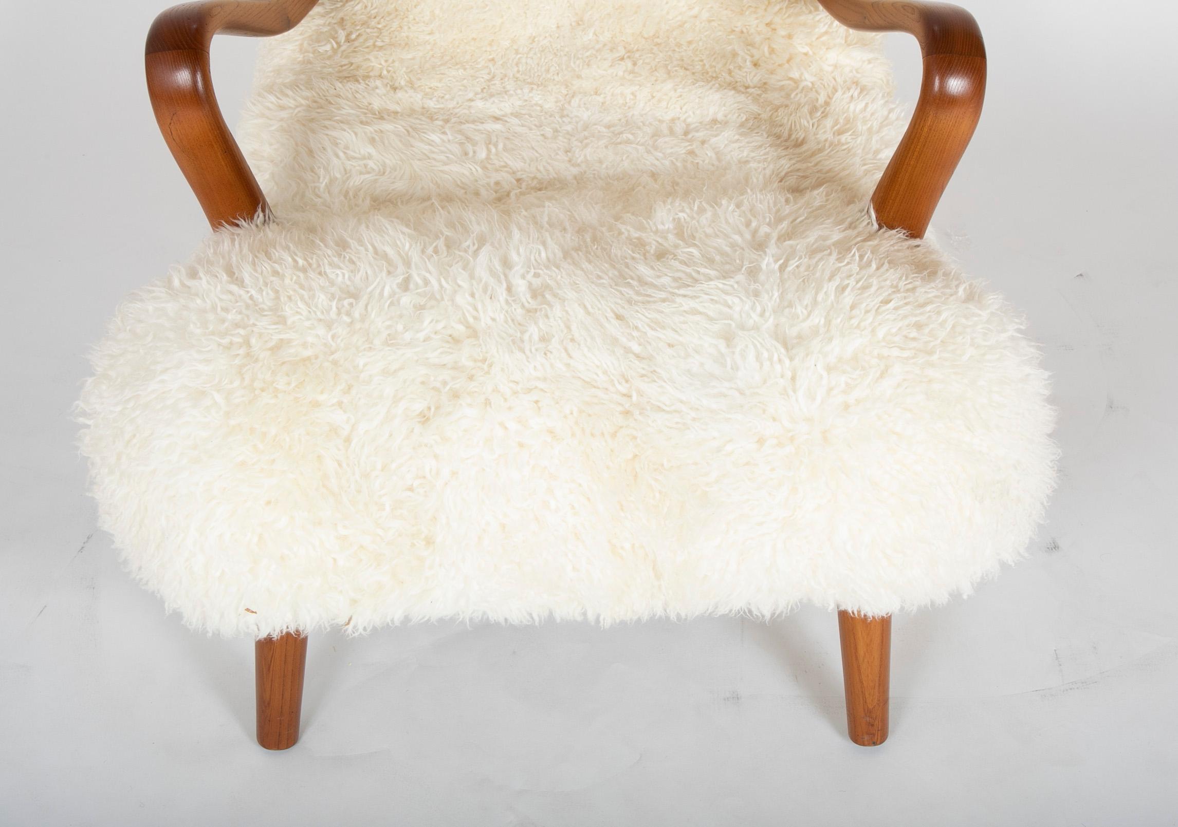 Midcentury Danish Chair of Elm Wood and Sheepskin in the Style of Arctander 1