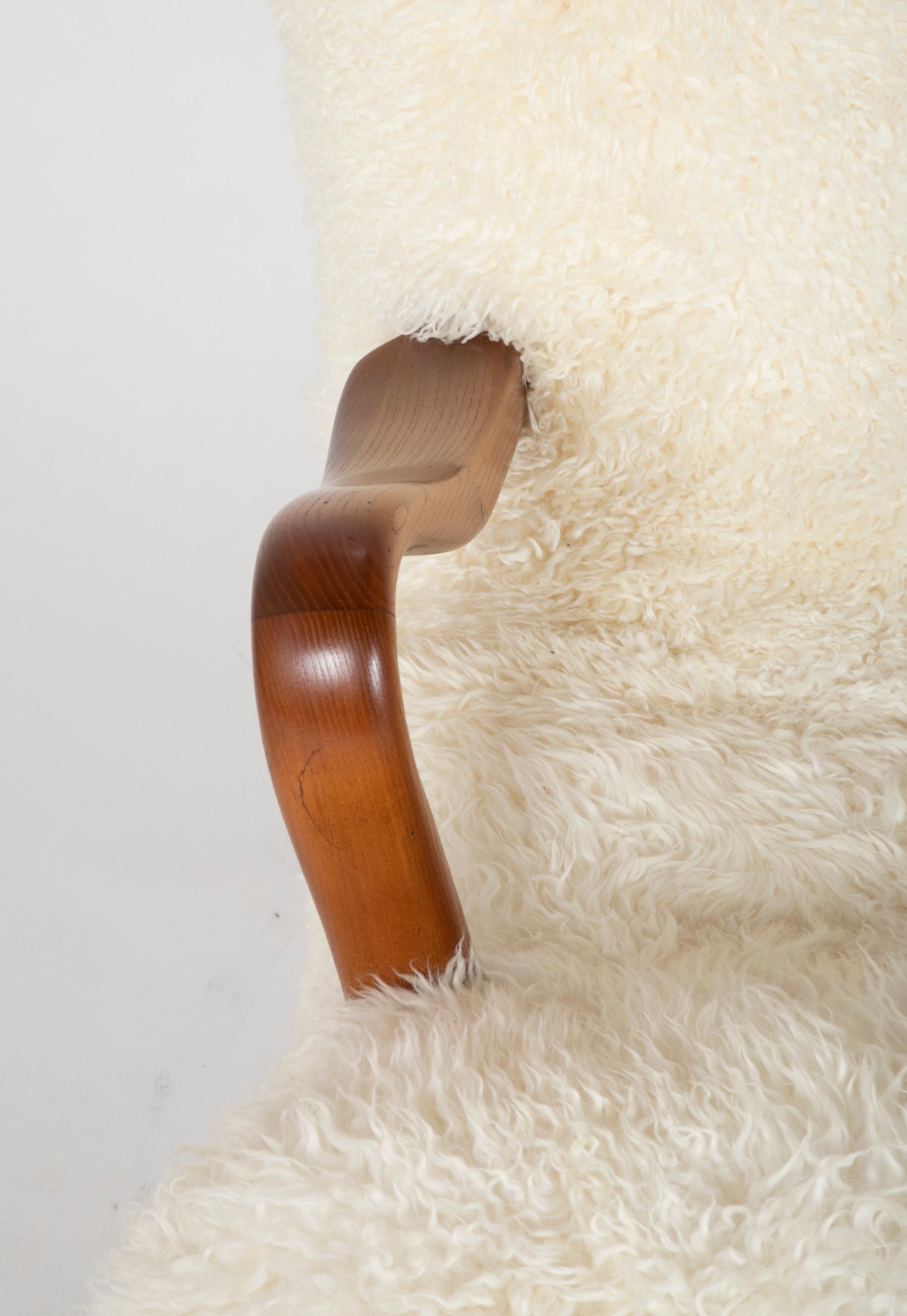 Midcentury Danish Chair of Elm Wood and Sheepskin in the Style of Arctander 4
