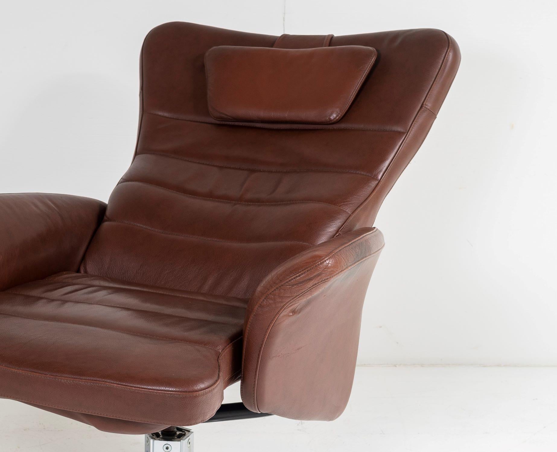 Mid Century Danish Cognac Brown Leather Swivel Reclining Chair on Chrome Base For Sale 9