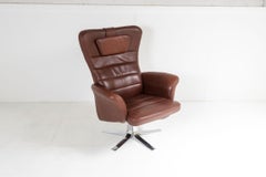 Mid Century Danish Cognac Brown Leather Swivel Reclining Chair on Chrome Base