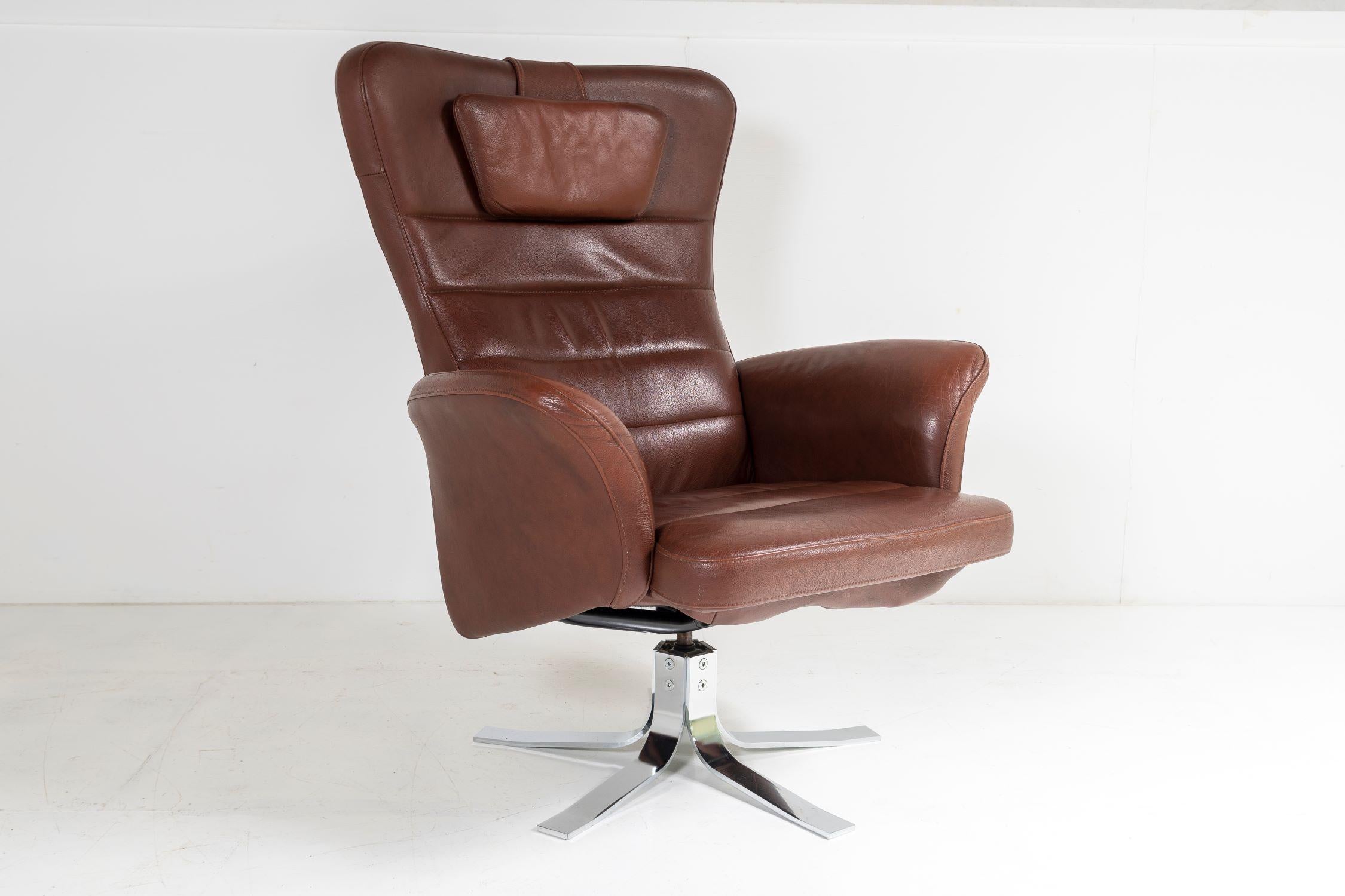 Mid-Century Modern Mid Century Danish Cognac Brown Leather Swivel Reclining Chair on Chrome Base For Sale