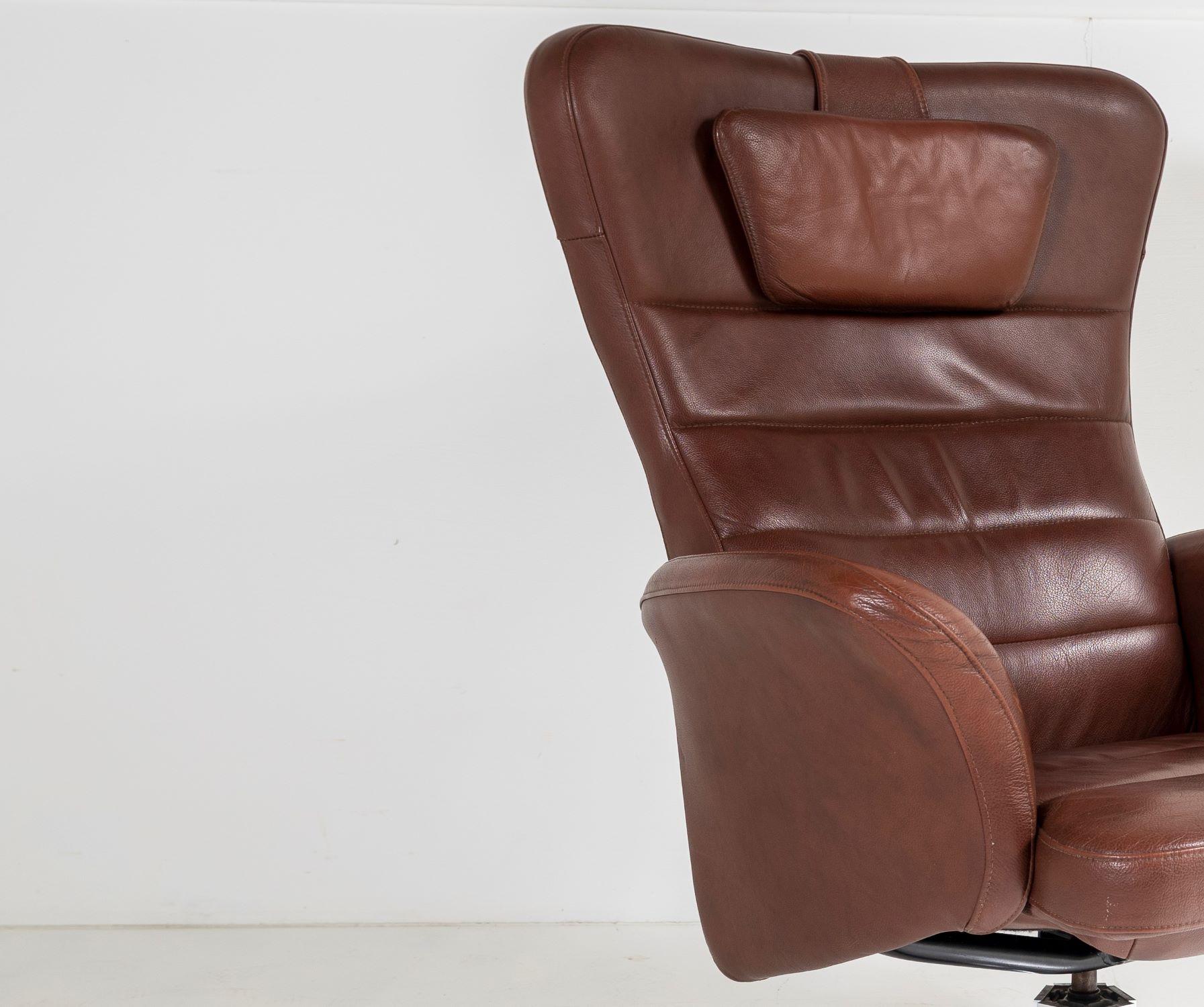 20th Century Mid Century Danish Cognac Brown Leather Swivel Reclining Chair on Chrome Base