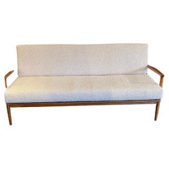 Mid-Century Danish Curated, Walnut sofa with Boucle  new cushions 1960’s Circa