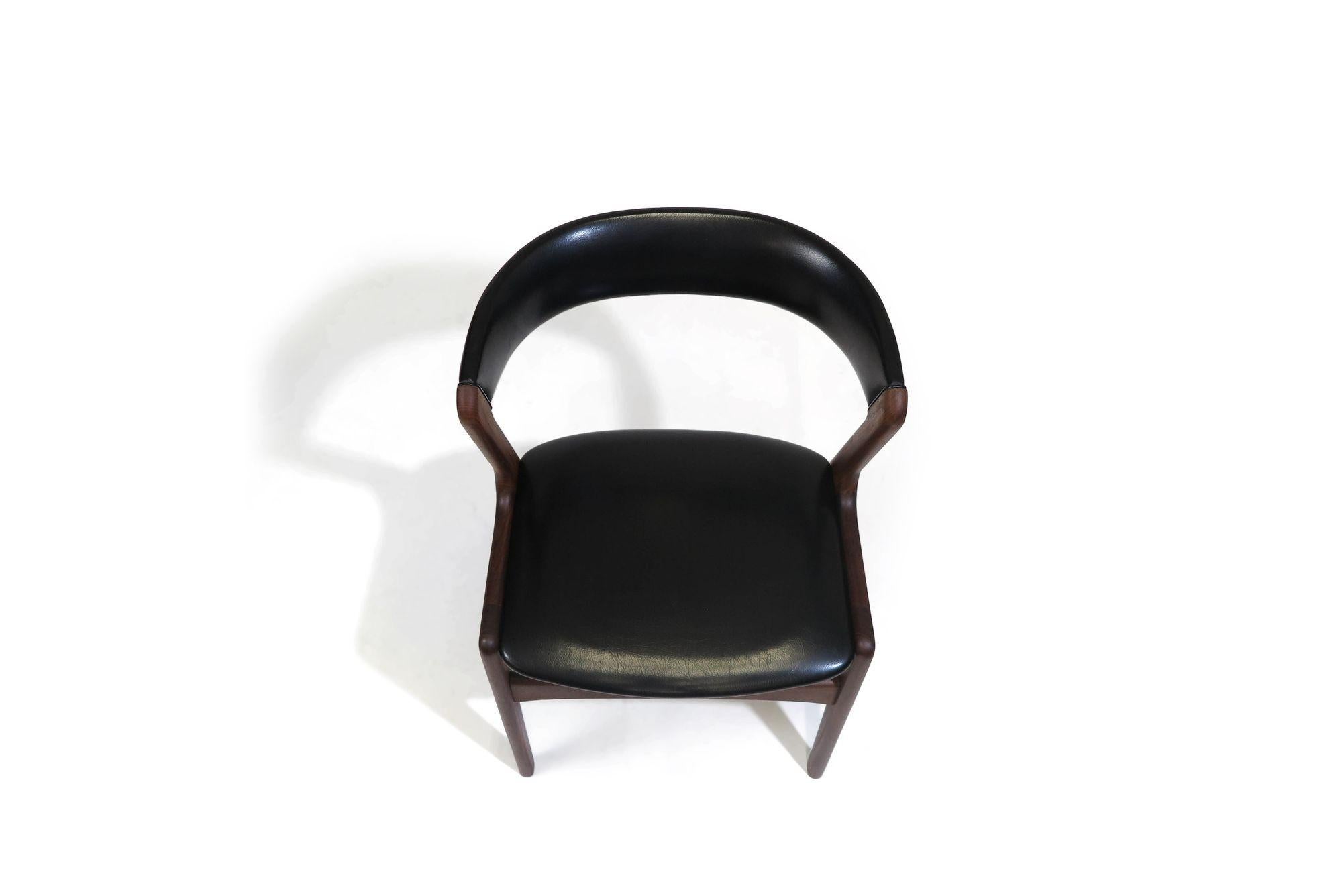 Midcentury Danish Curved Back Dining Chairs in Black Vinyl For Sale 1