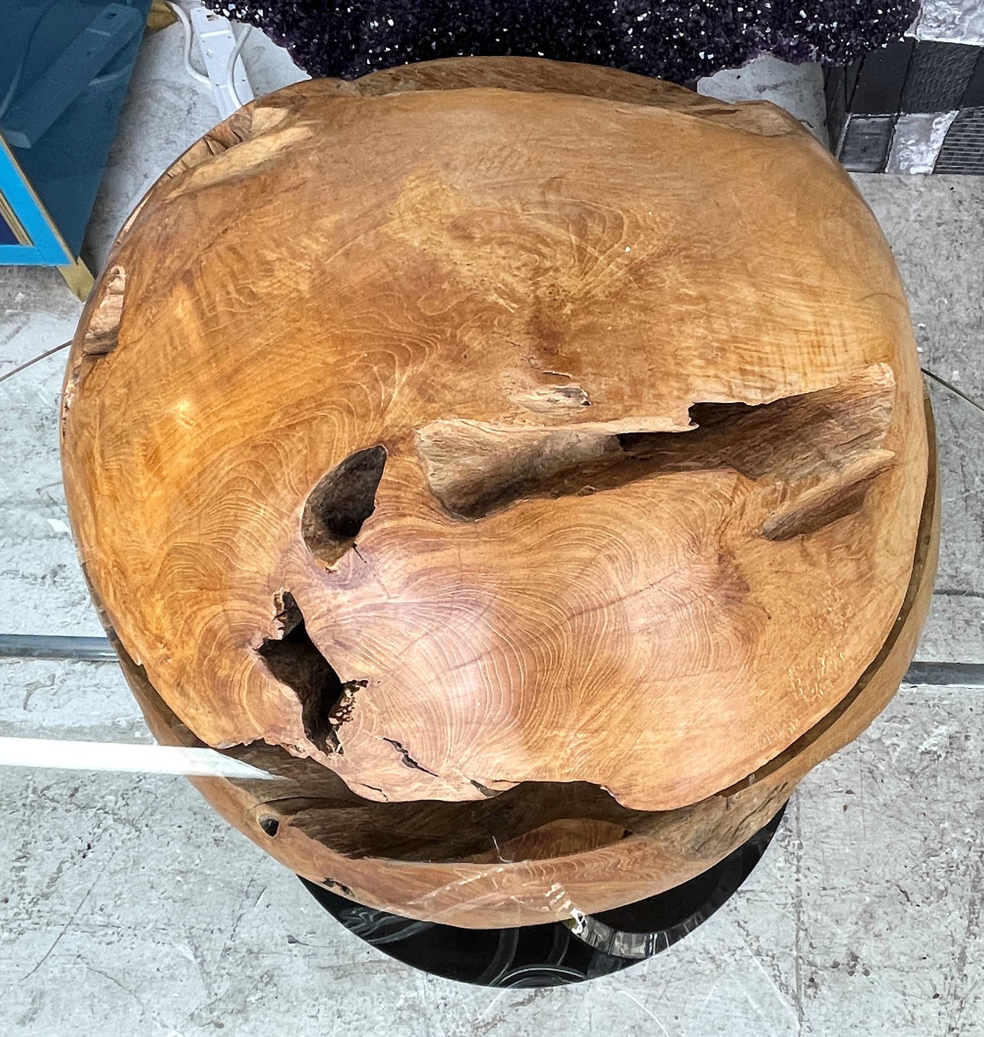 A very lovely way to bring Mother Nature into your interior with this large Danish tree root sphere customized into a cocktail table base, with an oval glass insert. The table is very stable and in very good condition.