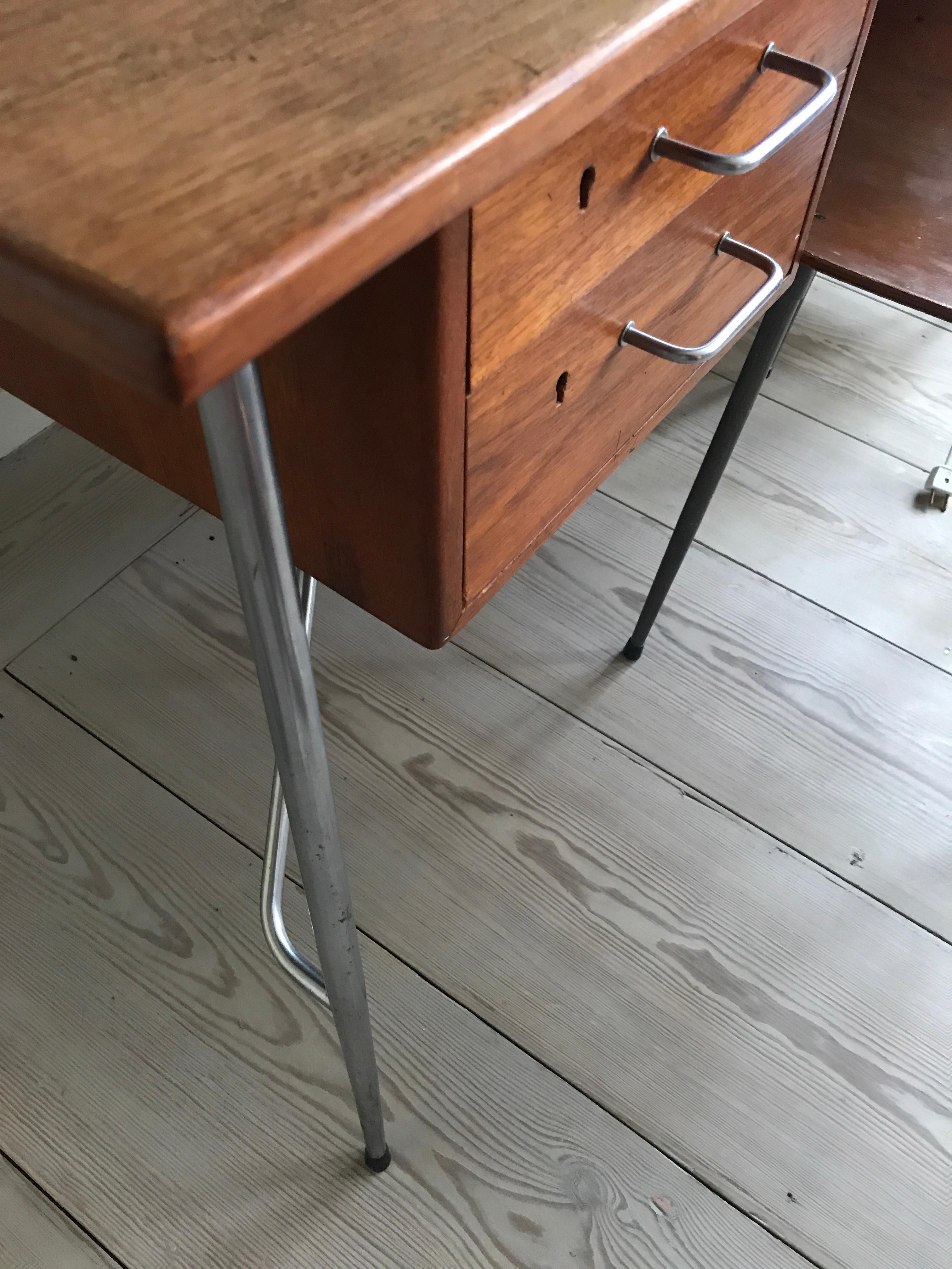 Beautiful set of Børge Mogensen teak chair and desk with steal frame and two drawers.