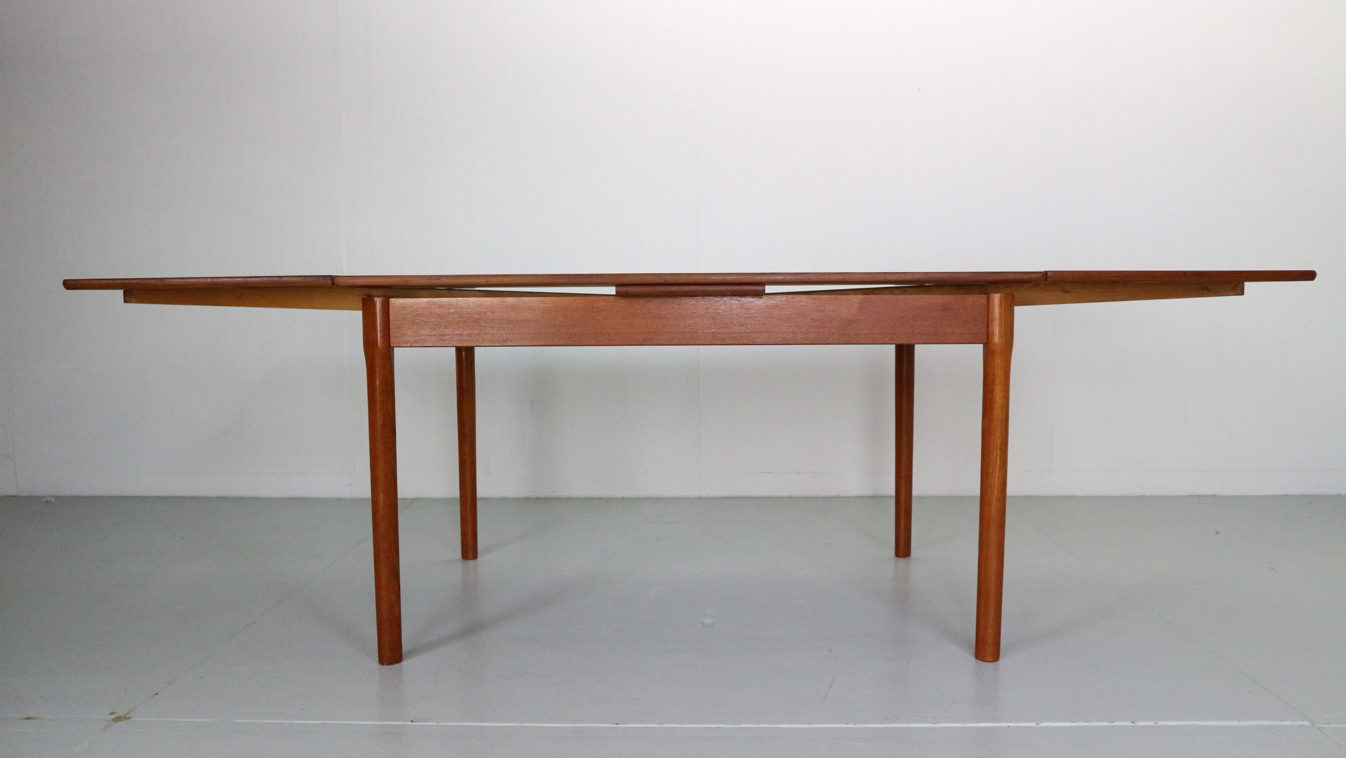 Mid-century period design extendable dinning table made from teak wood. Has beautiful wood pattern and elegant legs.
Made in Denmark, 1960s.
Dimensions: 130cm - Extendable 232cm.
 
The legs can be unscrewed for a shipping.
Extendable two leaves