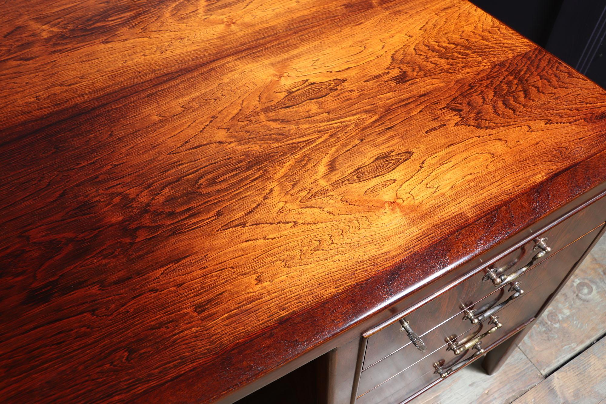 Danish desk by Ole Wanscher
A Mid-Century Modern desk designed by Ole Wanscher and produced by A J Iverson in Denmark in the 1950’s, exceptional quality Danish craftsmanship with English influence the desk has eight drawers the top two are lockable