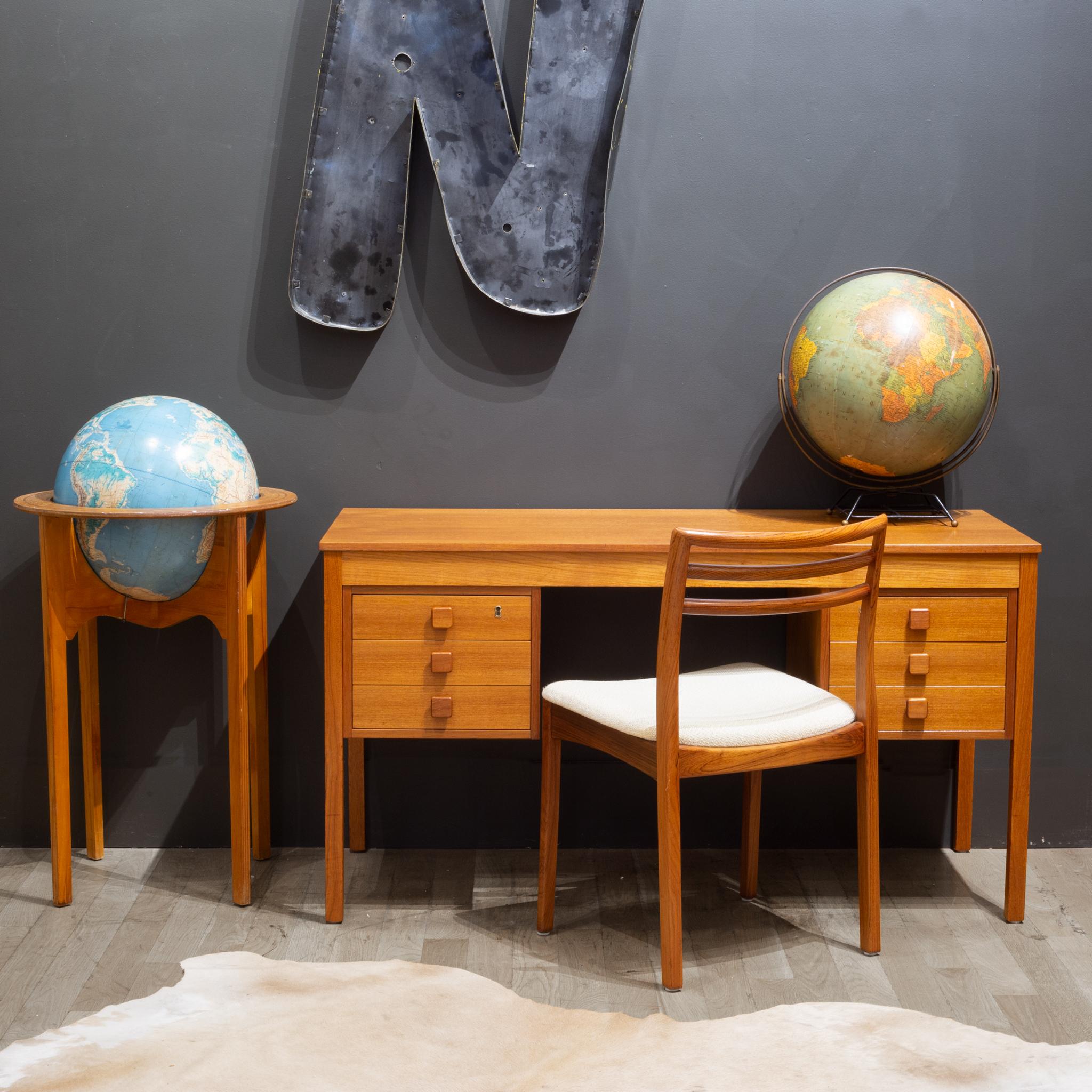 About

A Mid-Century Modern Danish teak desk by Domino Mobler with 6 drawers, dovetail joints, original brass key and brass locks on both sides. Original label underneath.

Creator Domino Mobler, Denmark,
Date of