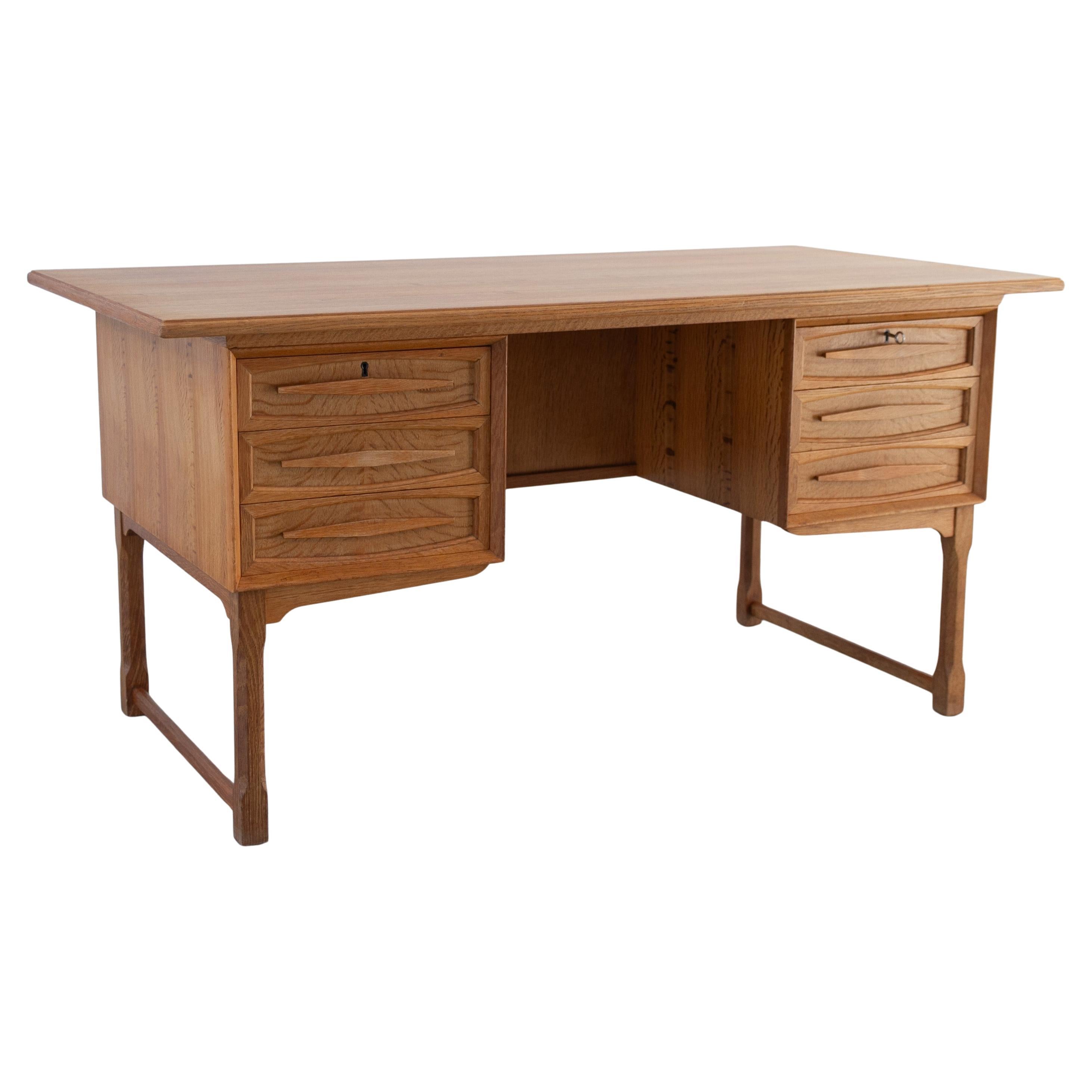 Mid-Century Danish Freestanding Oak Desk attributed to Henning Kjærnulf, 1960s. For Sale