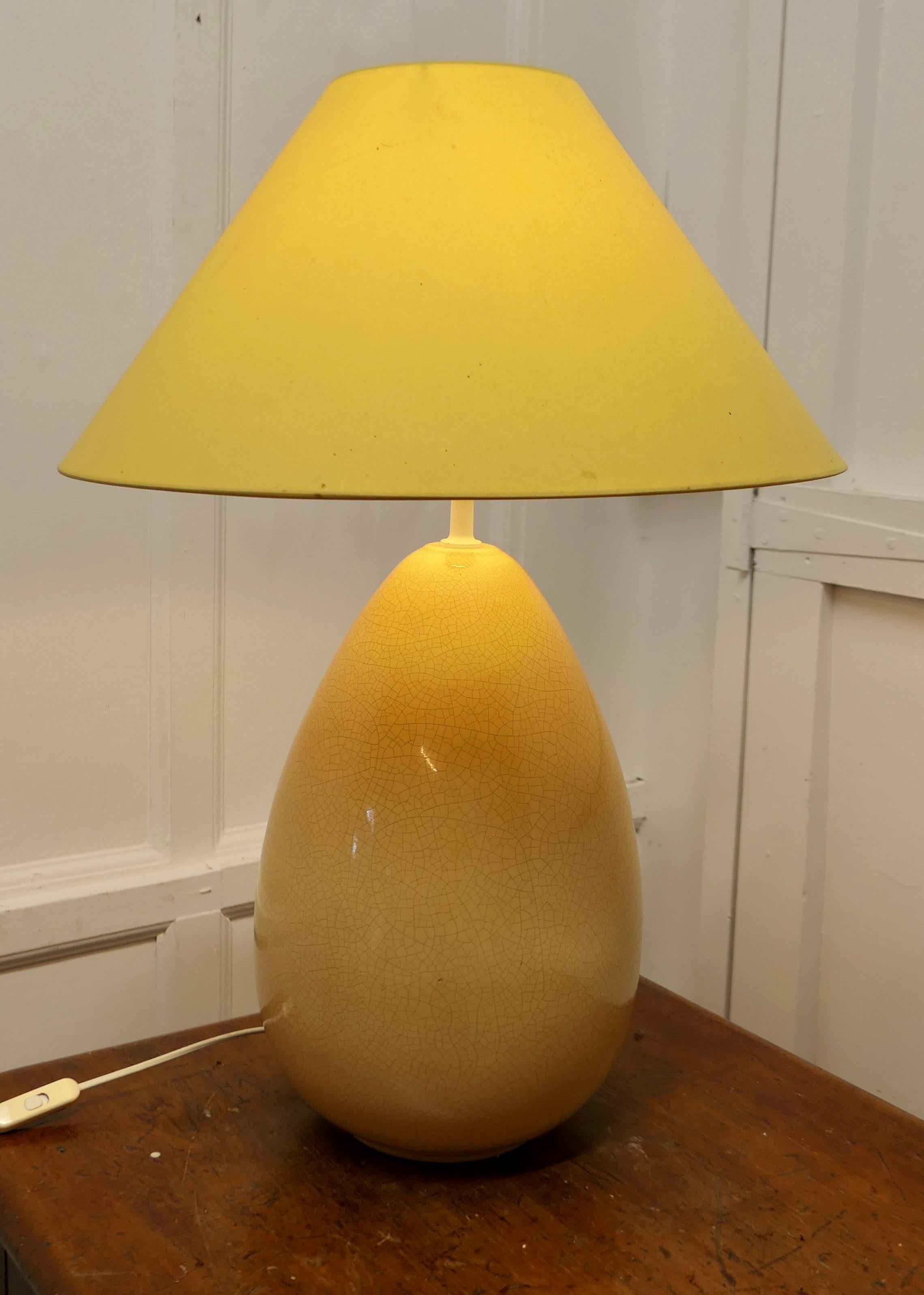  Mid Century Danish Giant Egg Lamp

A very noticeable piece, the large ceramic egg has a crackle finish to the glaze and comes with its original coolie shade
The whole piece is 28” high was 19” in diameter
VY141