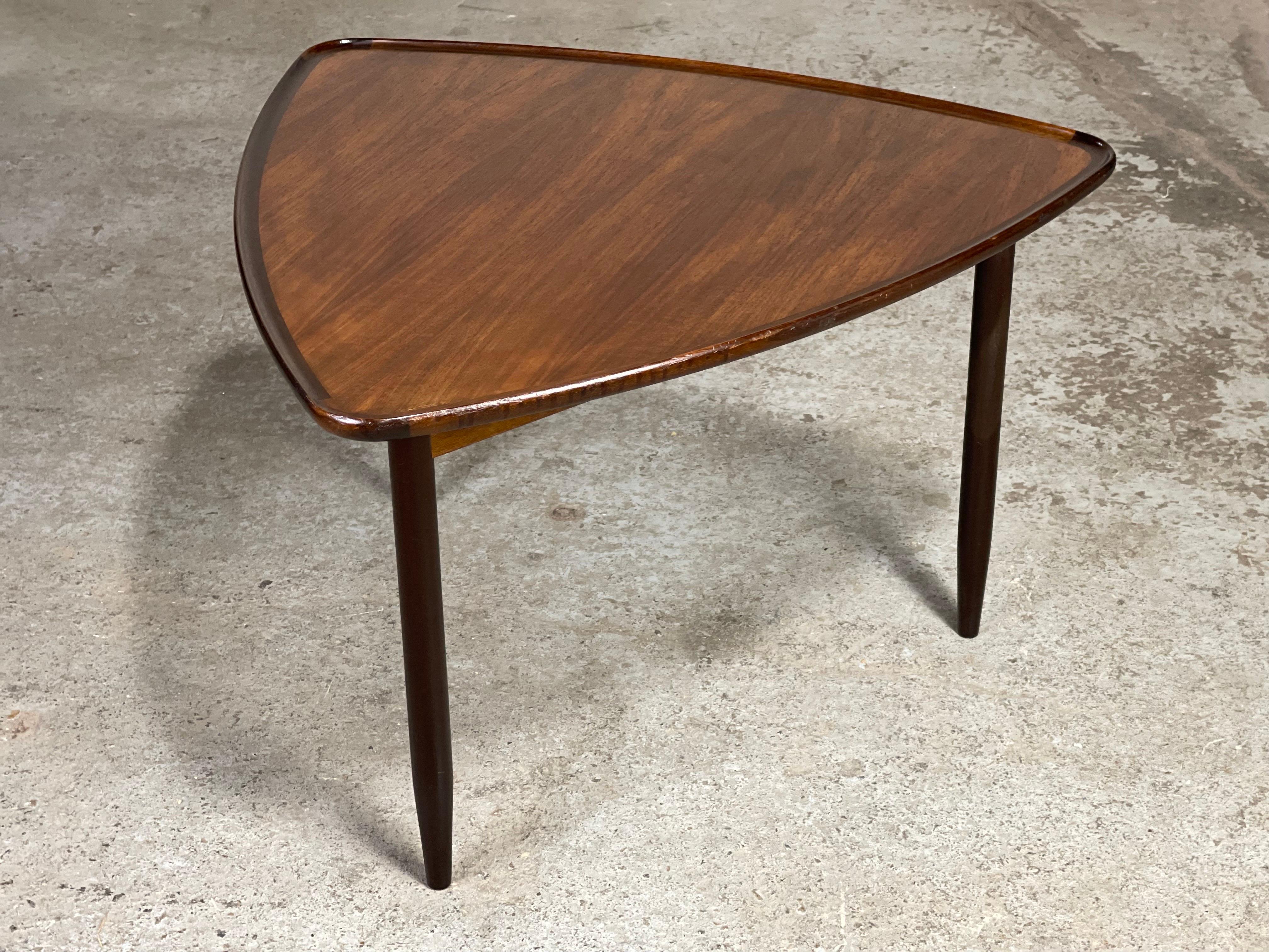 Patina Rich early 1950's mid century danish modern wedge table by Poul Jensen in oiled walnut. A very early example. Original condition. I can refinish the edges if you wish - no charge - I like to leave it up to the buyer. There is some normal edge