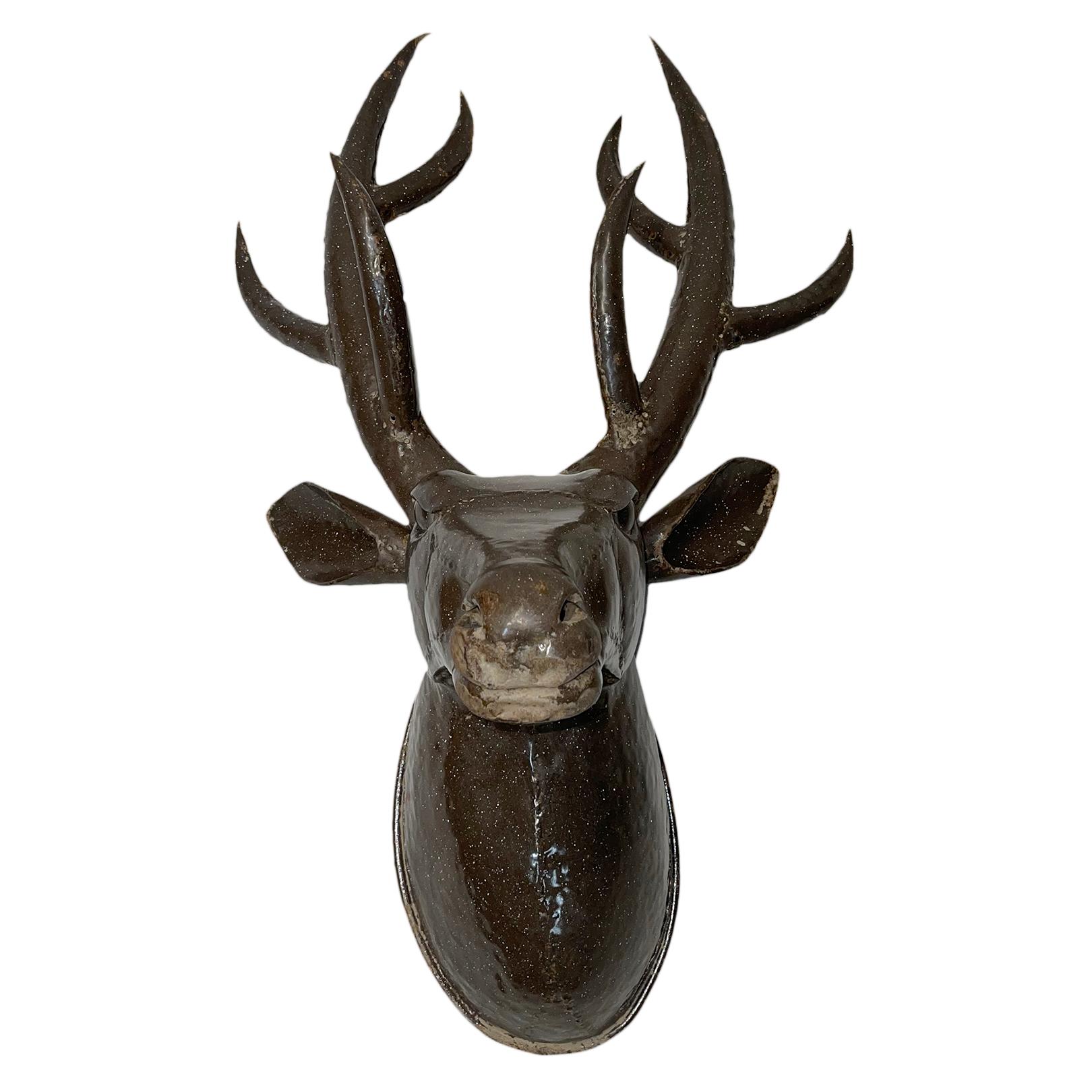 A Danish circa 1960's hand-forged and painted iron stag head wall sculpture.

Measurements:
Height: 37