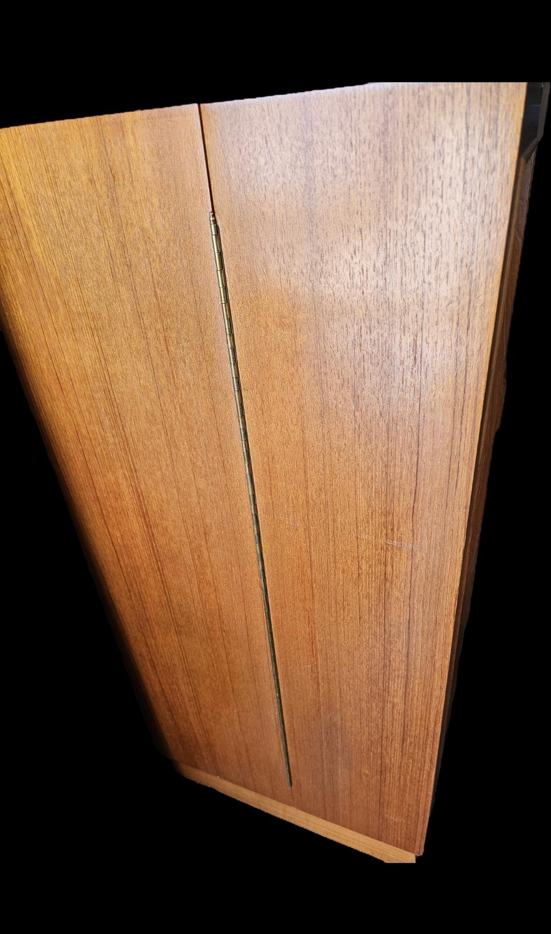 Beautifully engineered. 
Teak.
Danish.
Vintage Magic Box Desk. 
Lots of cubbies, file areas, organizer drawer, fold out desk.
All in a great compact design. 
Withstands the ages.