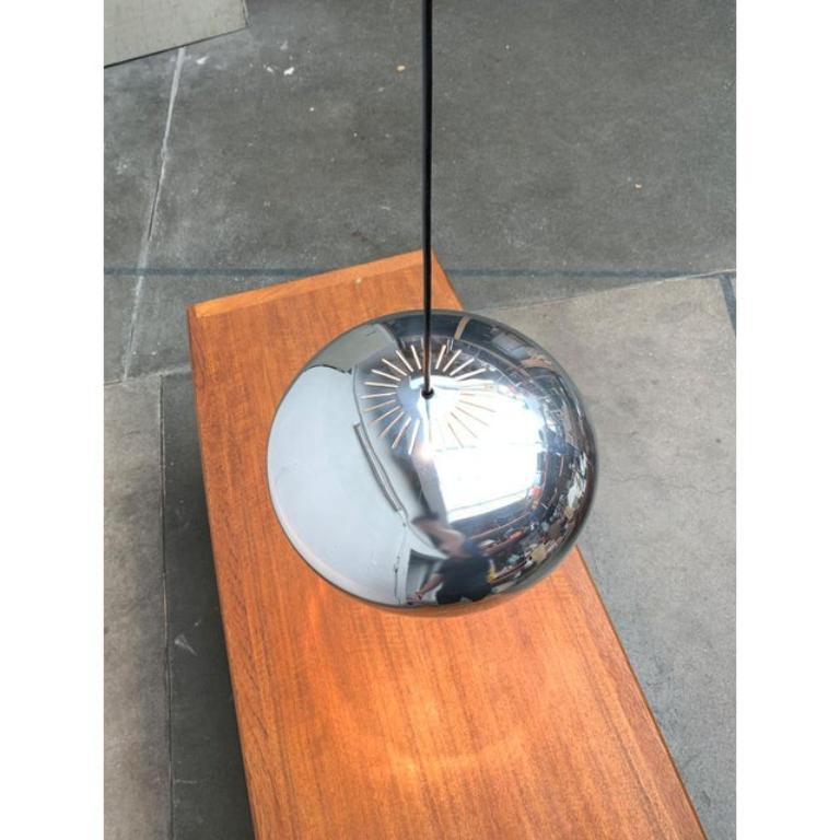 Elegant pendant lamp from the Danish manufacturer Fog & Mørup after a design by Jo Hammerborg from the 1960s.

A simple and timeless design. The lamp body shows a simple pill shape with soft curves. The fine long hole perforation on the top is