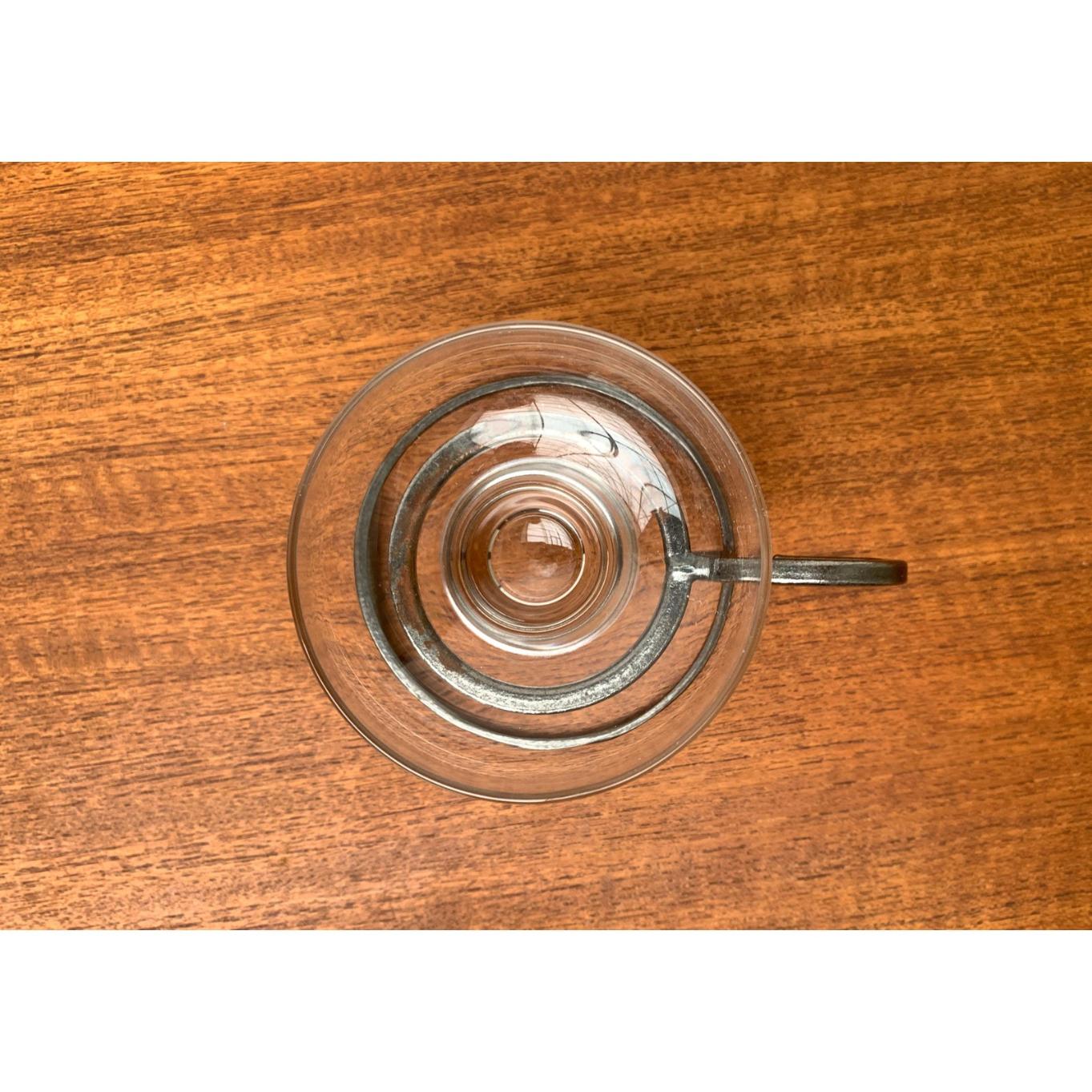 Mid-Century Danish Metal and Glass Candleholder, 1960s, in Very Good conditions. Designed 1960 to 1969.

Additional information:
Materials: Glass, Metal
Styles: Mid-Century Modern
Country of Origin: Denmark
Item Type: Vintage, Antique or